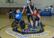 A wheelchair rugby game tips off at the base gym on Edwards Air Force Base, California, Oct. 24. The wheelchair rrugby, or murderball, demonstration was headed by the Triumph Foundation, a non-profit organization, in support of the base's observance of National Disability Employment Awareness Month. (U.S. Air Force photo by Giancarlo Casem)
