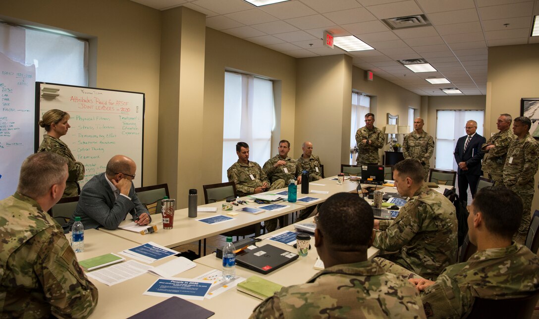 A large group of people participating in a discussion.