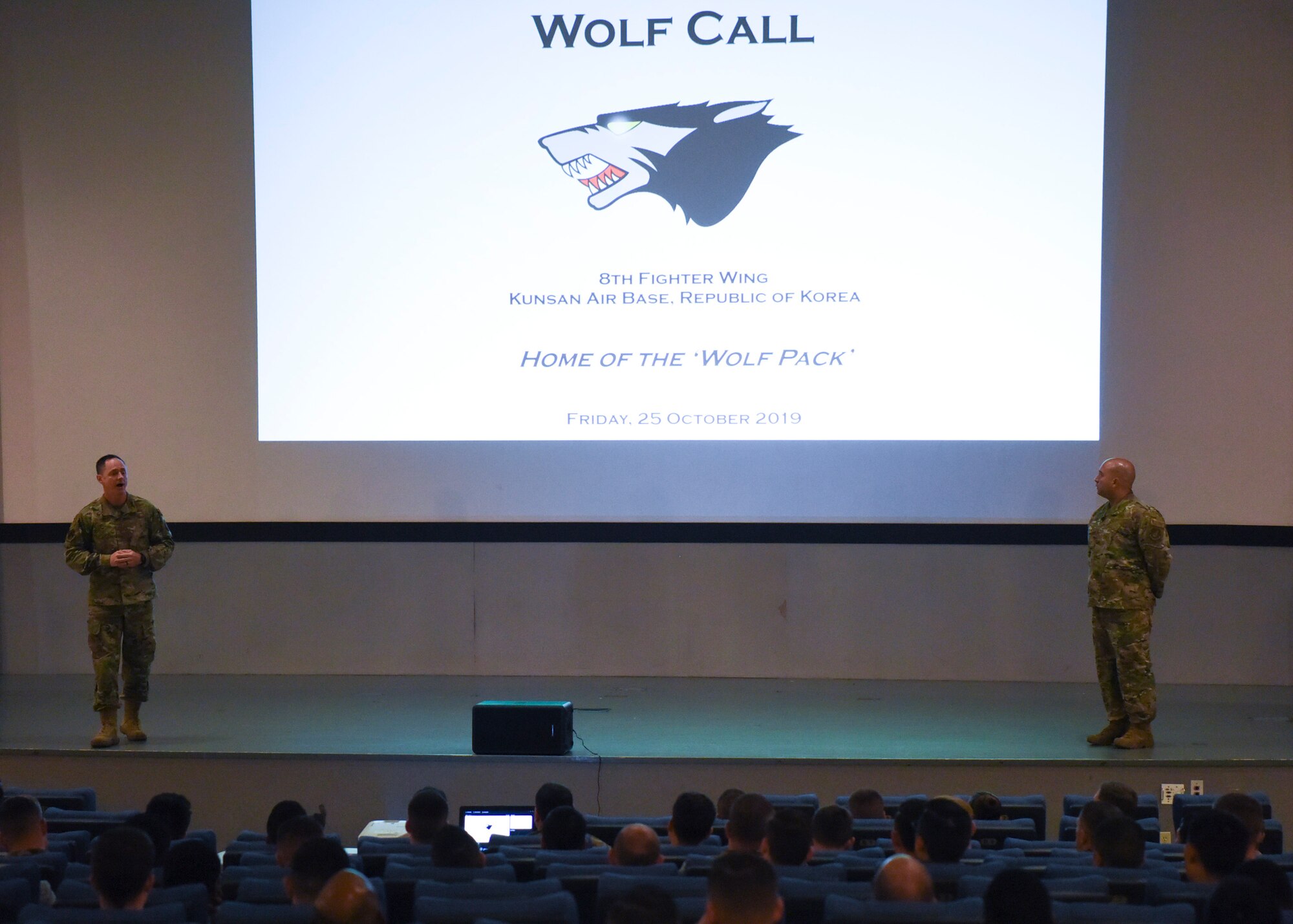 U.S. Air Force Col. Tad Clark, 8th Fighter Wing commander and Chief Master Sgt. Steve Cenov, 8th FW command chief, host their second commander’s call for the members of the Wolf Pack at Kunsan Air Base, Republic of Korea, Oct. 25, 2019. The commander’s call gave base leaders the opportunity to elaborate on multi-domain operations, squadron empowerment, multi-functional Airmen, agile combat employment, readiness and innovation. (U.S. Air Force photo by Staff Sgt. Anthony Hetlage)