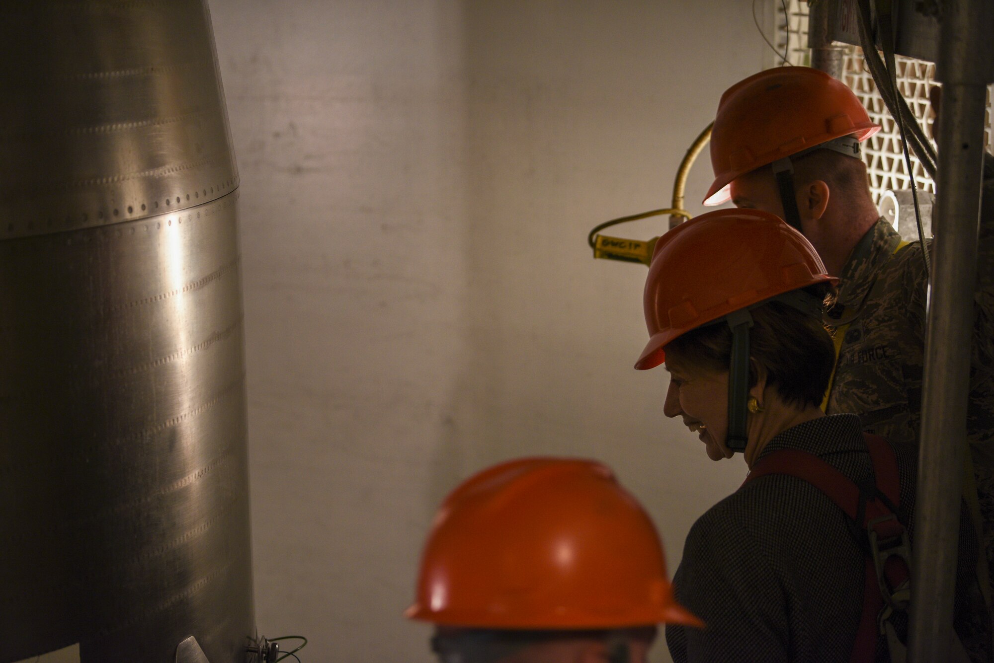 Secretary of the Air Force Barbara Barrett and Senior Airman Zachary Twieg, 90th Missile Maintenance Squadron technician, ride down into U-01 Launch Facility, at F.E. Warren Air Force Base, Wyo., on Oct. 27, 2019. The U-01 launch facility is a training facility used to instruct Airmen on how to do proper missile maintenance.