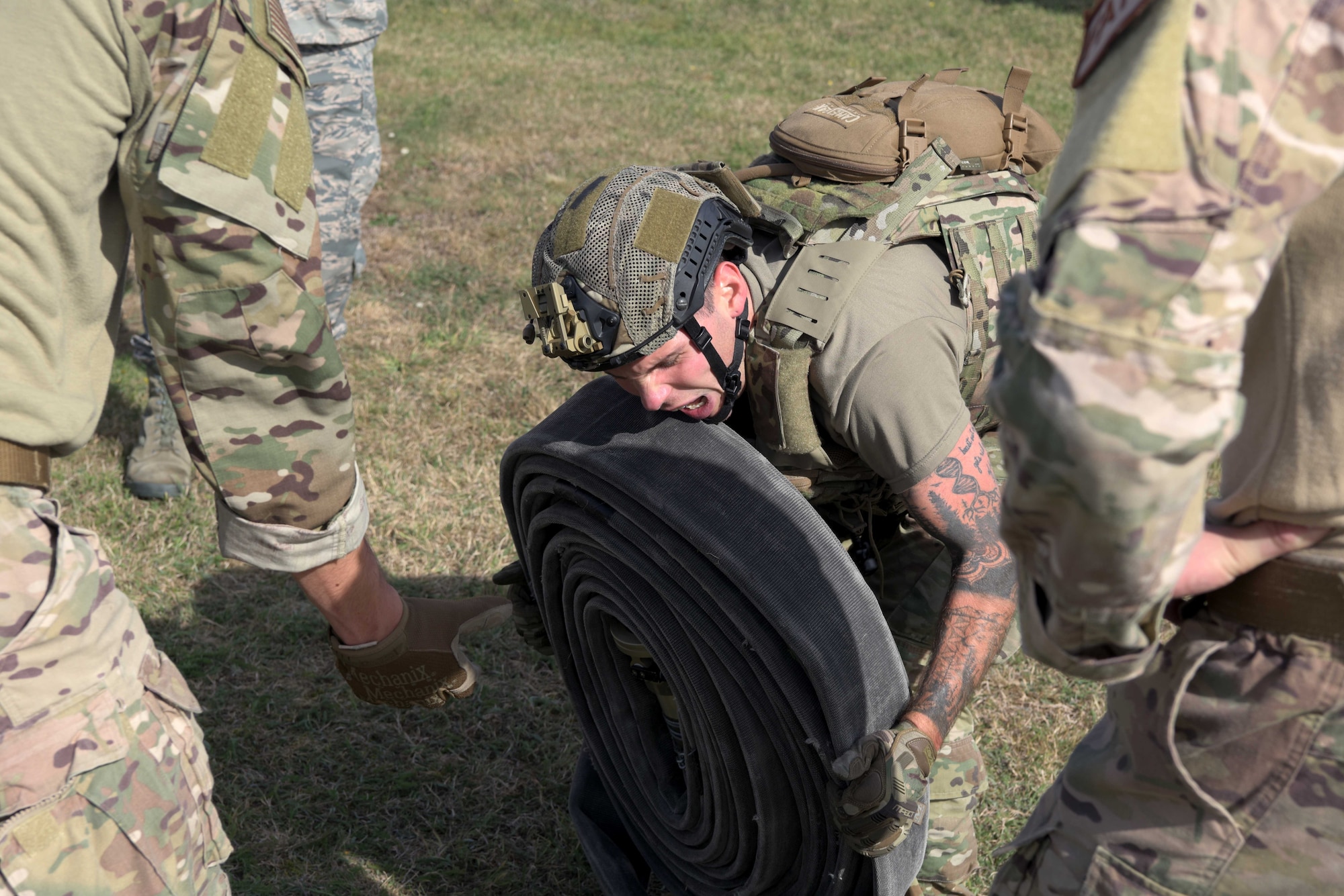 Staff Sgt. Phillip Switzer, 100th Logistics Readiness Squadron fuels distribution supervisor, picks up a hose during a Forward Area Refueling Point team tryout at RAF Mildenhall, England, Sept. 13, 2019. A specialty of the fuels career field, FARP’s job is to establish refueling sites and refuel aircraft in austere locations. (U.S. Air Force photo by Senior Airman Benjamin Cooper)