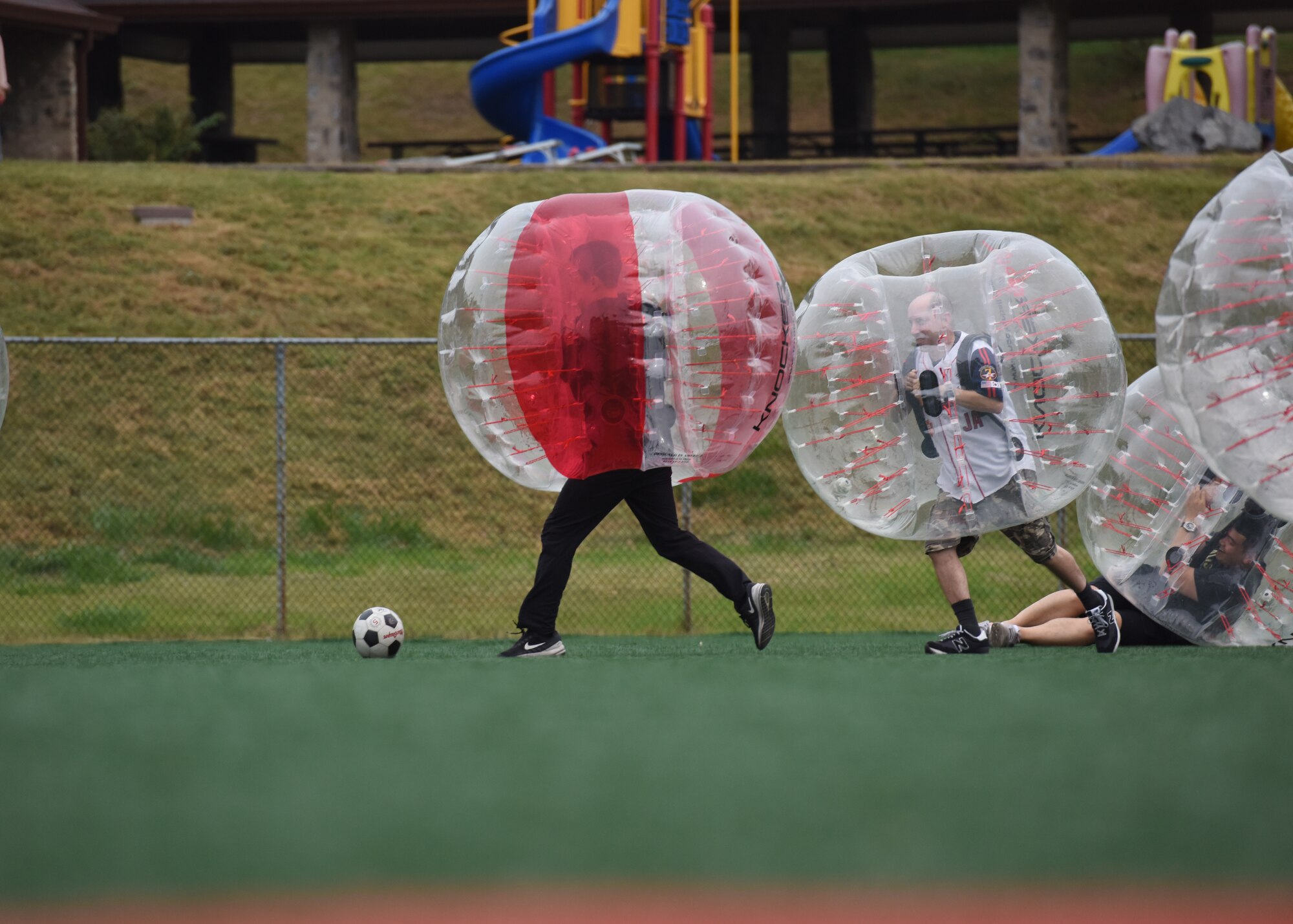 Members of the U.S. and Republic of Korea Air Forces legal teams play a game of bubble soccer during a Friendship Day at Osan Air Base, ROK, October 23, 2019. The purpose of the day was to give both counterparts the opportunity to spend time together and strengthen the ties between the two nations. (U.S. Air Force photo by Senior Airman Denise M. Jenson)