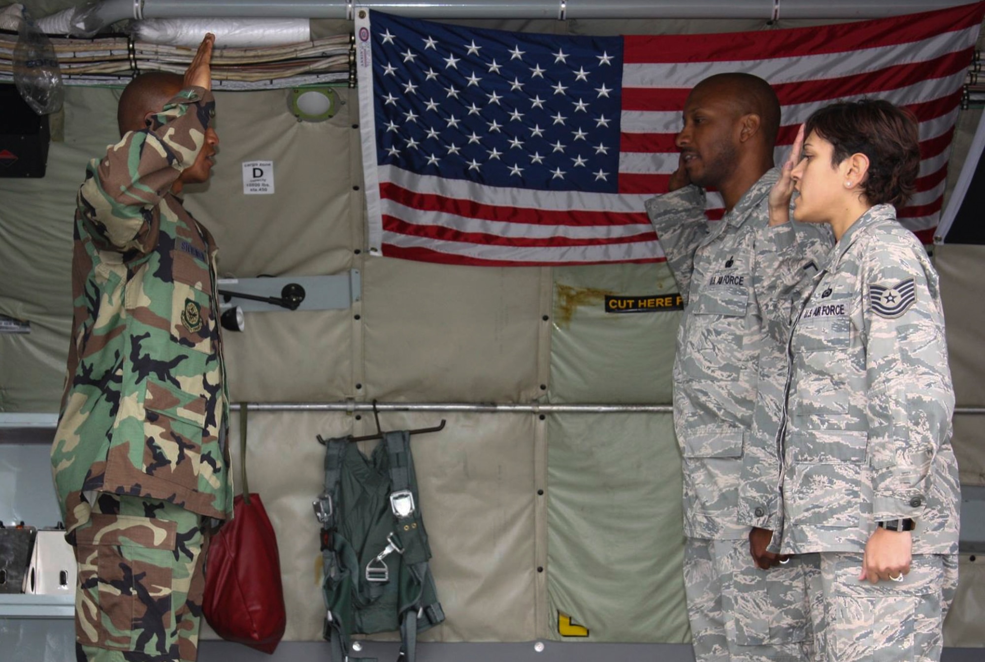 Retired U.S. Air Force Chief Master Sgt. Robinson Joseph, former U.S. Air Forces in Europe – Air Forces Africa Chief Enlisted Manager for the Air Force Installation Contracting Center, and his wife, retired Chief Master Sgt. Leenette Joseph, former USAFE Equal Opportunity functional manager, are pictured during their reenlistment in the Air Force.
