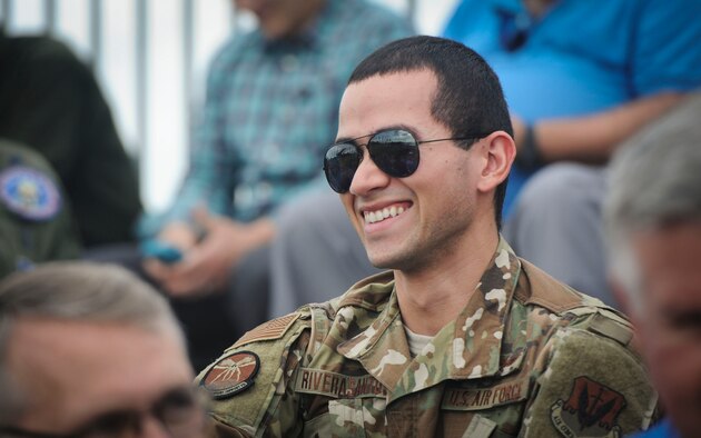 1st Lt. Osvaldo J. Rivera Santos, Air Combat Command Cyber Operations Division deputy flight commander, laughs after a resiliency walk on Joint Base Langley-Eustis, Virginia, Oct. 25, 2019. General Mike Holmes, commander of ACC, led the event to give staff members an opportunity to connect with their coworkers outside of the office. (U.S. Air Force photo by Tech. Sgt. Nick Wilson)