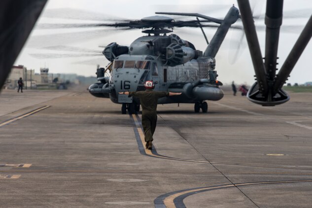 A CH-53E Super Stallion helicopter taxies from the runway during a rapid deployment exercise conducted by 1st Marine Aircraft Wing, III Marine Expeditionary Force, Okinawa, Japan, Oct. 25, 2019. As the only forward deployed MEF, III MEF is strategically postured to quickly and effectively respond to any crisis using austere, expeditionary bases and established airfields within the Indo-Pacific region.