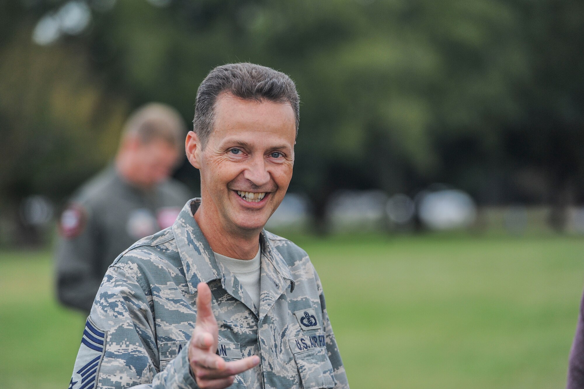 Chief Master Sgt. Charlie Anderson, Air Combat Command Heritage of America Band superintendent, smiles after a resiliency walk on Joint Base Langley-Eustis, Virginia, Oct. 25, 2019. The resiliency walk was organized as part of the commander of ACC’s initiative to provide staff members with an opportunity to move, nourish refresh and connect during the duty day. (U.S. Air Force photo by Tech. Sgt. Nick Wilson)