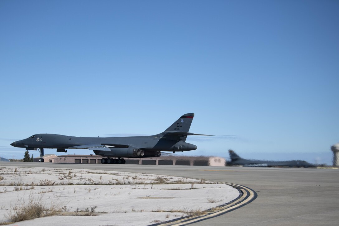 A B-1B Lancer taxis down the runway at Ellsworth Air Force Base, S.D., prior to taking off in support of a Bomber Task Force mission in the U.S. Central Command area of operations, Oct. 24, 2019. The unannounced arrival of the B-1 demonstrates the global strike capacity and ability of the U.S. Air Force and Air Force Global Strike Command to rapidly deploy forward and deliver precision-guided ordnance against any adversary. Bomber missions demonstrate the credibility of our forces to address a globe security environment that is more diverse and uncertain than at any other time in our history. (U.S. Air Force photo by Airman 1st Class Jesse Jenny)