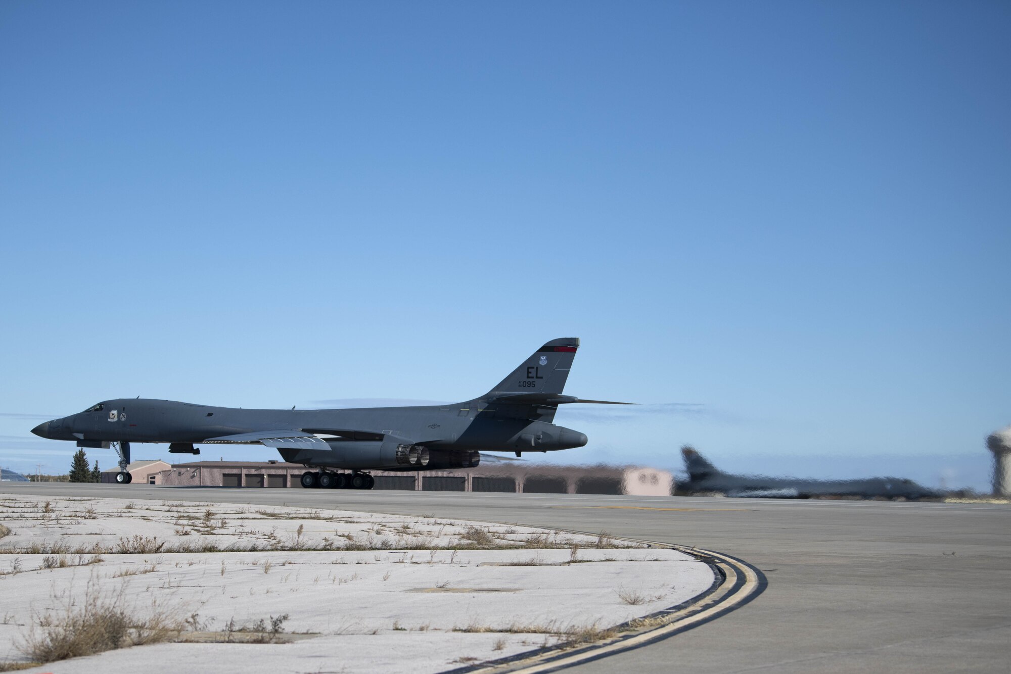 A B-1B Lancer taxis down the runway at Ellsworth Air Force Base, S.D., prior to taking off in support of a Bomber Task Force mission in the U.S. Central Command area of operations, Oct. 24, 2019. The unannounced arrival of the B-1 demonstrates the global strike capacity and ability of the U.S. Air Force and Air Force Global Strike Command to rapidly deploy forward and deliver precision-guided ordnance against any adversary. Bomber missions demonstrate the credibility of our forces to address a globe security environment that is more diverse and uncertain than at any other time in our history. (U.S. Air Force photo by Airman 1st Class Jesse Jenny)