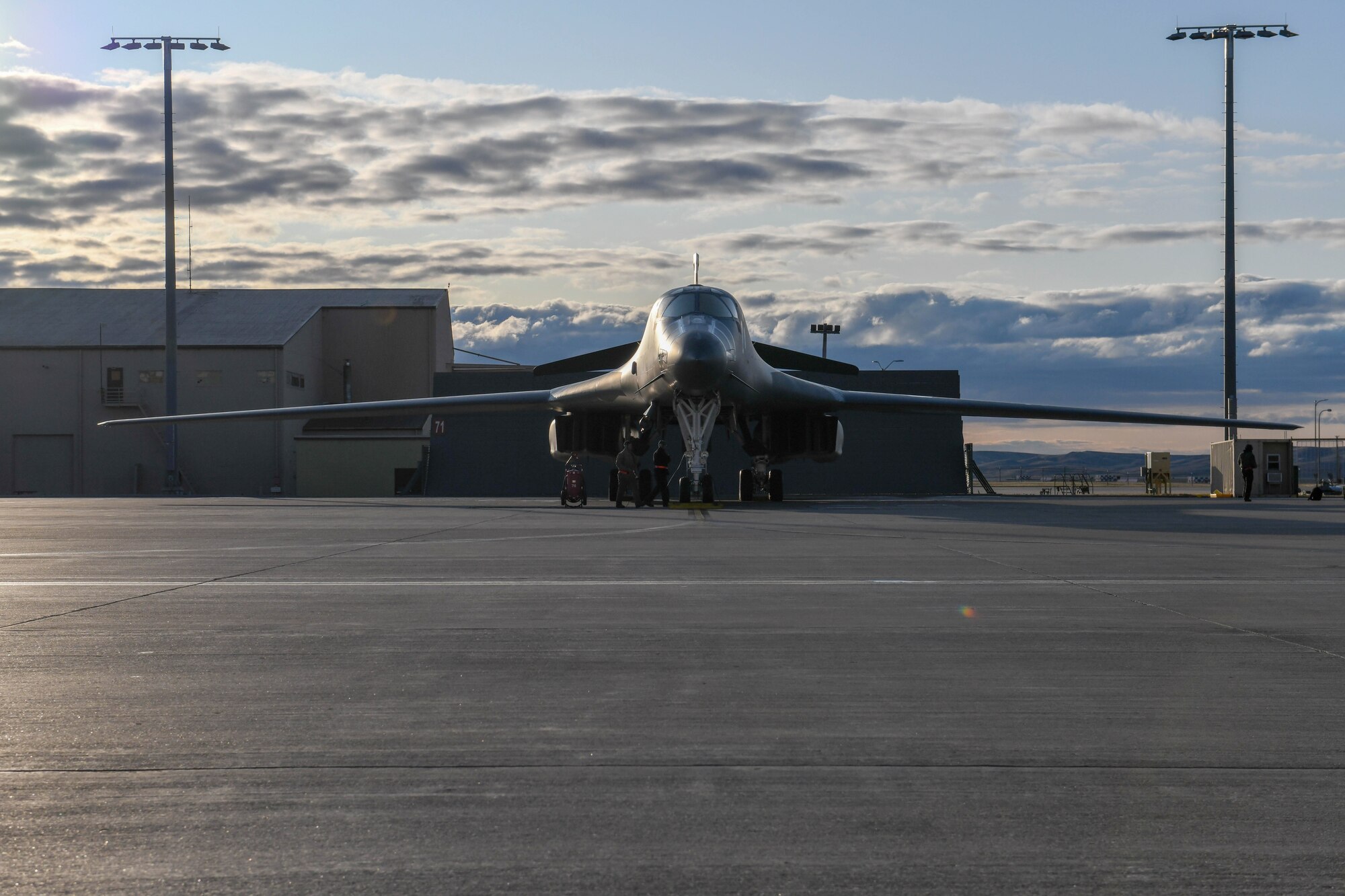 The B-1B Lancer sits on the row early in the morning at Ellsworth Air Force Base, S.D., prior launching to support a Bomber Task Force in the U.S. Central Command area of operations, Oct. 24, 2019. The deployment of this aircraft allows the United States and regional partner nations’ militaries to train and work together to strengthen military-to-military relationships, promote regional security, improve combined tactical air operations and enhance interoperability of forces. U.S. Strategic Command regularly tests and evaluates the readiness of strategic assets to ensure we are able to honor our security commitments. (U.S. Air Force photo by Senior Airman Nicolas Erwin)