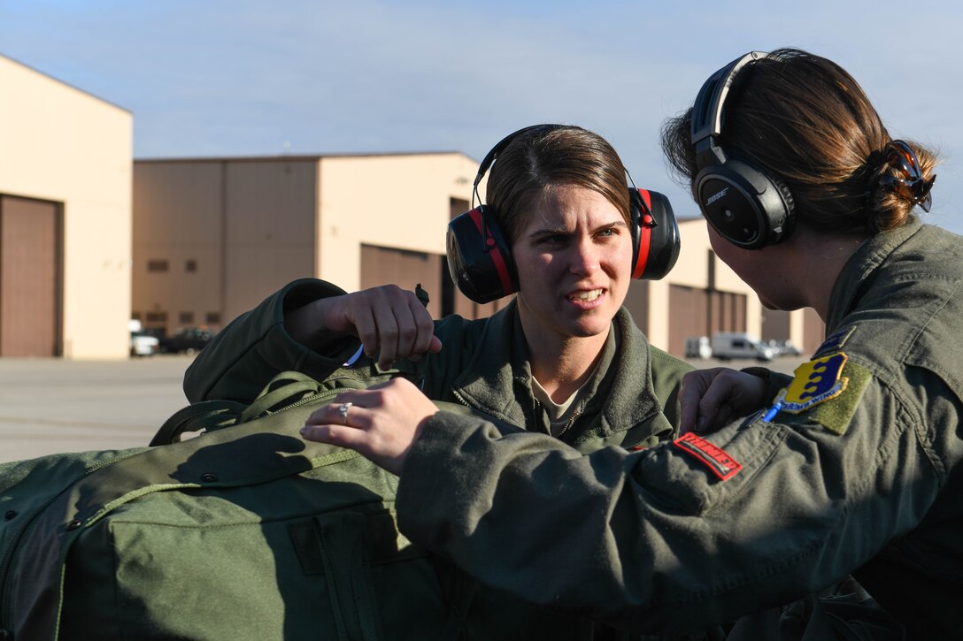 Crew members assigned to the 28th Bomb Wing, Ellsworth Air Force Base, S.D., grab their gear prior to boarding a B-1B Lancer, Oct. 24, 2019. Several B-1s flew to the U.S. Central Command area of operations to support of a Bomber Task Force. The deployment of this aircraft allows the United States and regional partner nations’ militaries to train and work together to strengthen military-to-military relationships, promote regional security, improve combined tactical air operations and enhance interoperability of forces. (U.S. Air Force photo by Senior Airman Nicolas Z. Erwin)