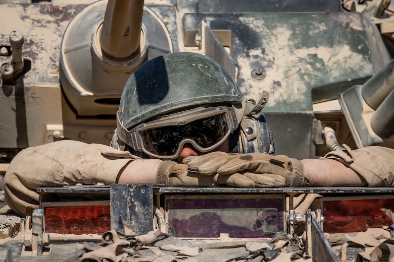 A U.S. Marine with the commanding general’s JUMP Platoon, 2nd Light Armored Reconnaissance Battalion, 2nd Marine Division (2d MARDIV) prepares to conduct a convoy at Camp Wilson, Marine Corps Air Ground Combat Center, Twentynine Palms, California, Oct. 26, 2019. The JUMP Platoon Marines are tasked to provide security and transportation for the commanding general throughout the MAGTF Warfighting Exercise (MWX) 1-20. MWX is set to be the largest exercise conducted by the 2d MARDIV in several decades. (U.S. Marine Corps photo by Pfc. Patrick King)