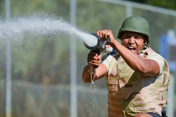 Air Commando sprays fire hose