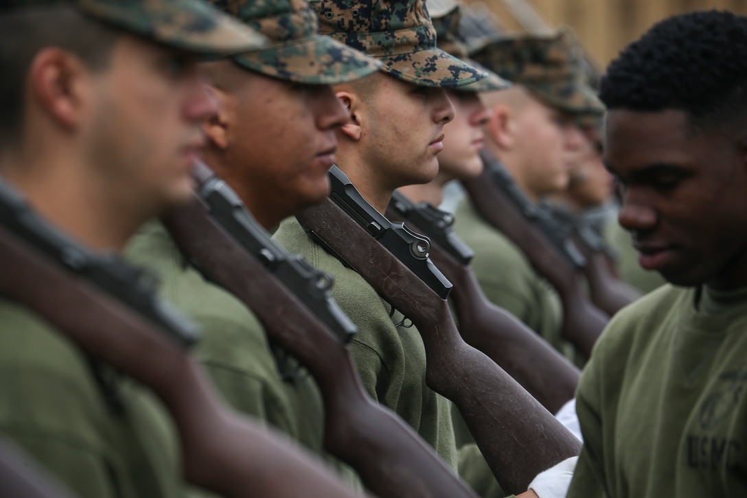 Marines with Alpha Company, Marine Barracks Washington, practice rifle manual at Marine Barracks Washington, D.C., Oct. 29, 2019. The Marines hone their rifle drill during Ceremonial Drill School. (U.S. Marine Corps photo by Sgt. Robert Knapp)