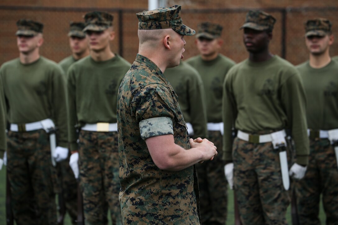 Marines with Alpha Company, Marine Barracks Washington, practice rifle manual at Marine Barracks Washington, D.C., Oct. 29, 2019. The Marines hone their rifle drill during Ceremonial Drill School. (U.S. Marine Corps photo by Sgt. Robert Knapp)