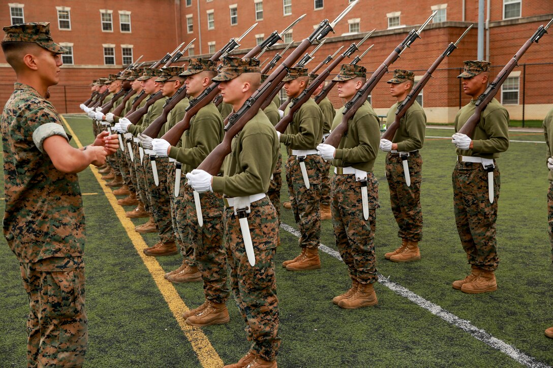 The Marines hone their rifle drill during Ceremonial Drill School.