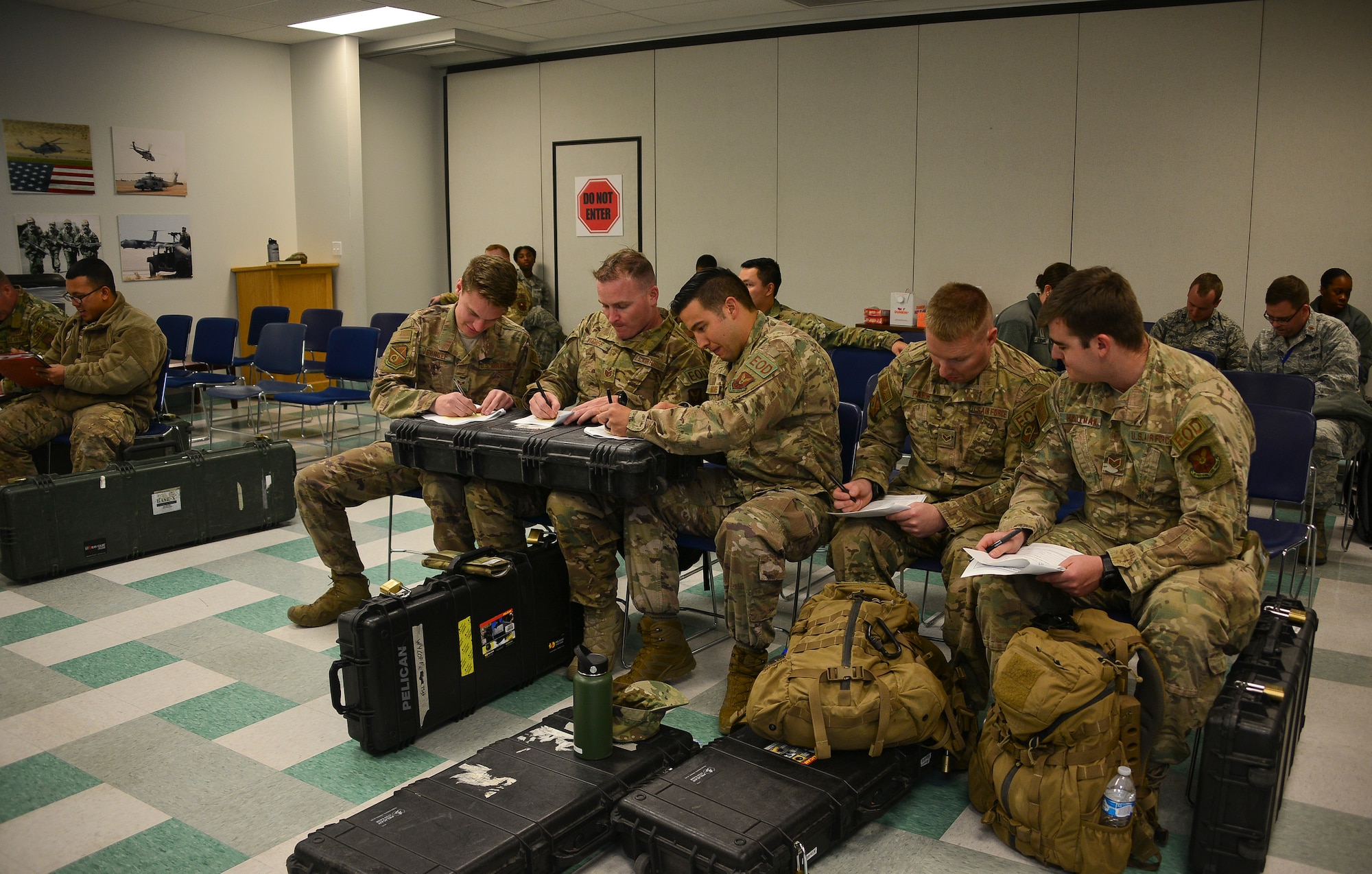 Members of Team Kirtland fill out pre-deployment paperwork during exercise Global Thunder 20 at Kirtland Air Force Base, N.M., Oct. 24, 2019. Global Thunder is a worldwide exercise that provides training opportunities for all of U.S. Strategic Command’s mission areas, tests joint and field training operations, and has a specific focus on nuclear readiness. (U.S. Air Force photo by Staff Sgt. Kimberly Nagle)