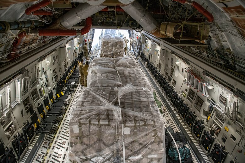 Rice and soy meals are flown to Honduras on a C-17.