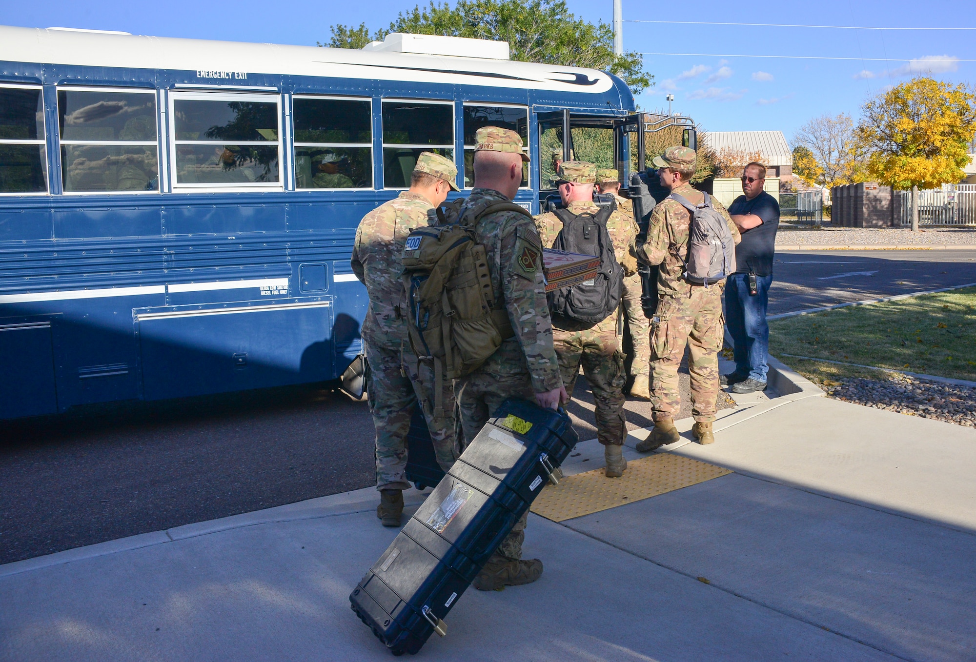 Members of Team Kirtland load onto the bus to deploy during exercise Global Thunder 20 at Kirtland Air Force Base, N.M., Oct. 24, 2019. Global Thunder is an annual nuclear command and control exercise that provides training opportunities for all of U.S. Strategic Command’s mission areas, tests joint and field training operations, and has a specific focus on nuclear readiness. (U.S. Air Force photo by Staff Sgt. Kimberly Nagle)