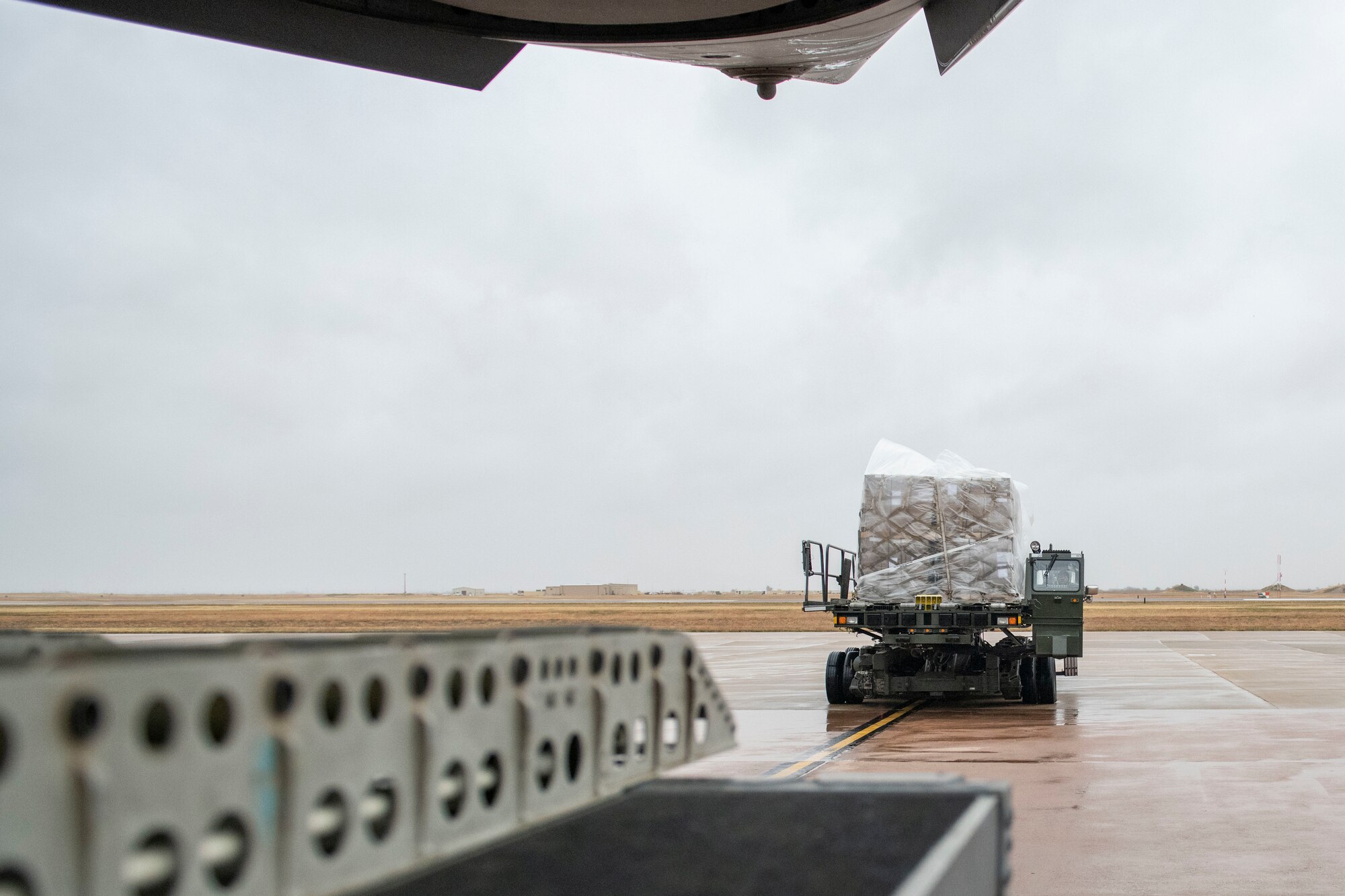 Rice and soy meals are flown to Honduras on a C-17.