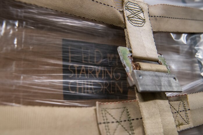 Rice and soy meals are flown to Honduras on a C-17.