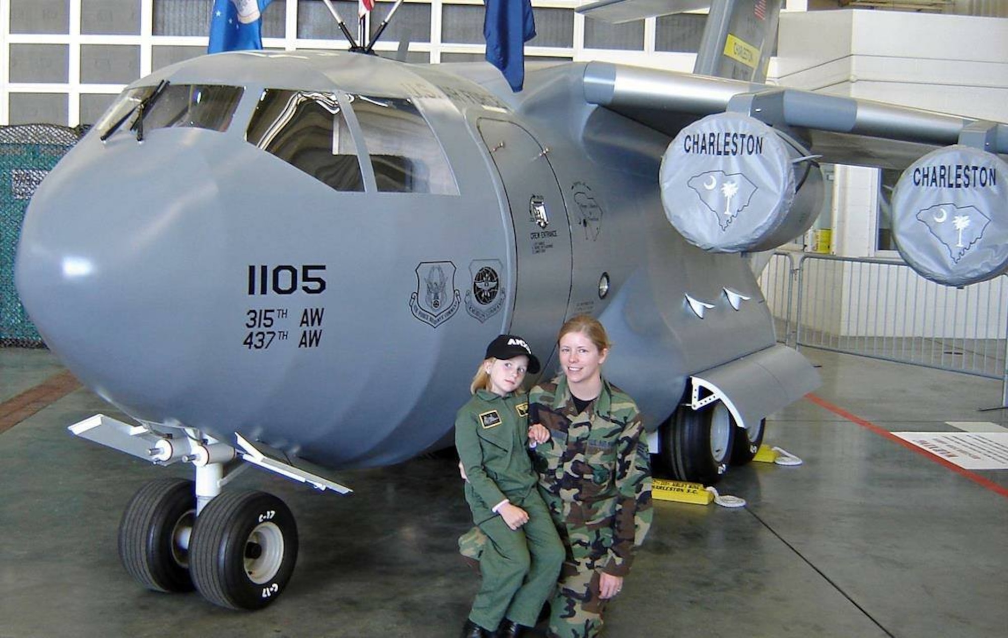 Staff Sgt. Ivy Abercrombie, 437th Aircraft Maintenance Squadron, and her daughter Hanah Abercrombie pose for a photo March 17, 2006, at Joint Base Charleston, S.C. Hanah joined the Air Force and graduated basic training December 2017, following in her parent's footsteps.  (Courtesy photo