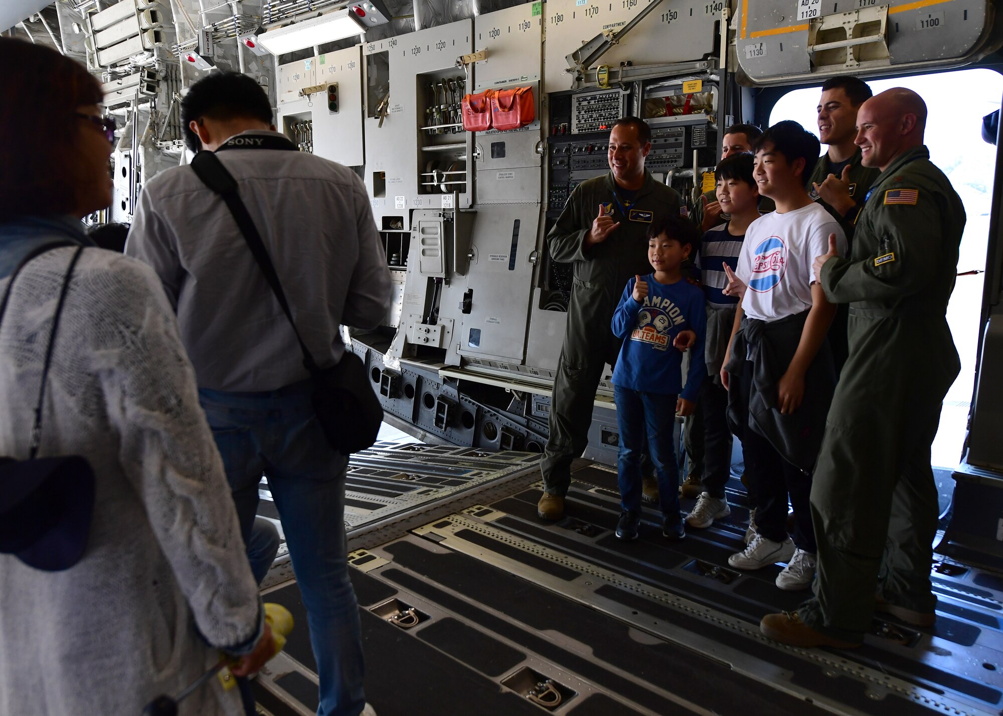 Members of the Pacific Air Forces C-17 Demonstration Team at Joint Base Pearl Harbor-Hickam, Hawaii, pose for a photo during the Seoul International Aerospace and Defense Exhibition 2019 at the Seoul Airport, Republic of Korea, October 19, 2019.