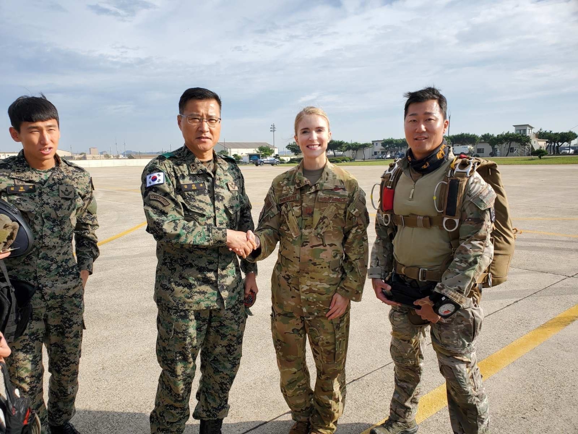 United States Air Force Captain Emily Barkemeyer stands alongside Republic of Korea allies.