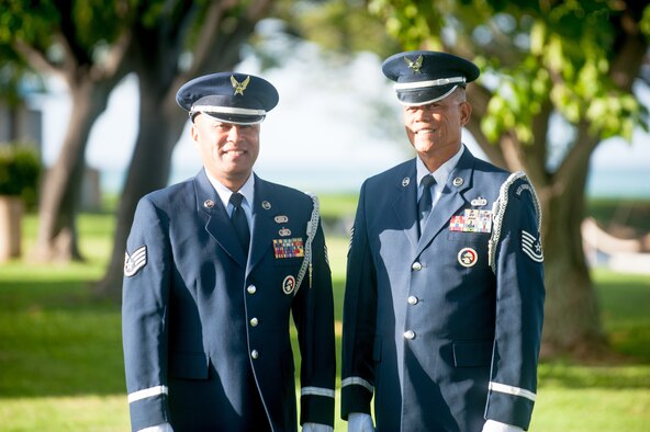 Staff Sgt. Darrell Bactad and Tech. Sgt. Mark Crabbe, 204th Airlift Squadron information managers, gather to practice Honor Guard movements Oct. 4, 2019, at Joint Base Pearl Harbor-Hickam, Hawaii.