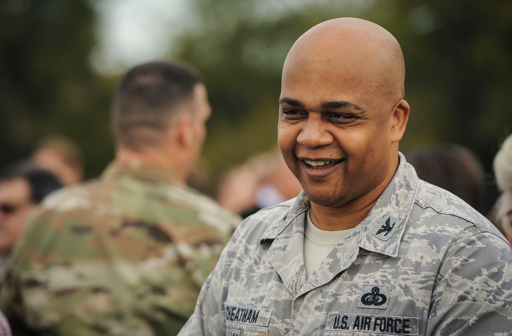 Col. Ronald Cheatham, Air Combat Command director of manpower, personnel and services, laughs with a colleague after a resiliency walk on Joint Base Langley-Eustis, Virginia, Oct. 25, 2019. The commander of ACC directed all of his staff members to get out of the office, move and connect as part of an effort to improve morale and sharpen resilience. (U.S. Air Force photo by Tech. Sgt. Nick Wilson)