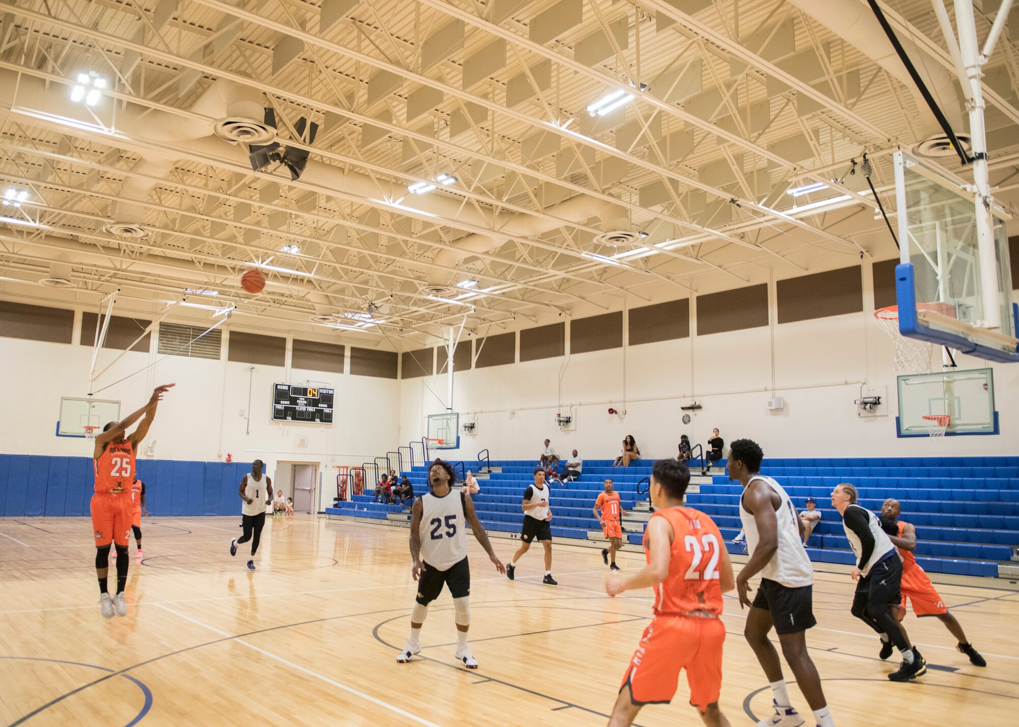 Basketball players for the Mountain Home Air Force Base Gunfighters play against a local team, Aug. 25, 2019, at Mountain Home Air Force Base, Idaho. The Gunfighters faced off with a team made of college players and players who've participated in the National Basketball Association's development league. (U.S. Air Force photo by Senior Airman Tyrell Hall)