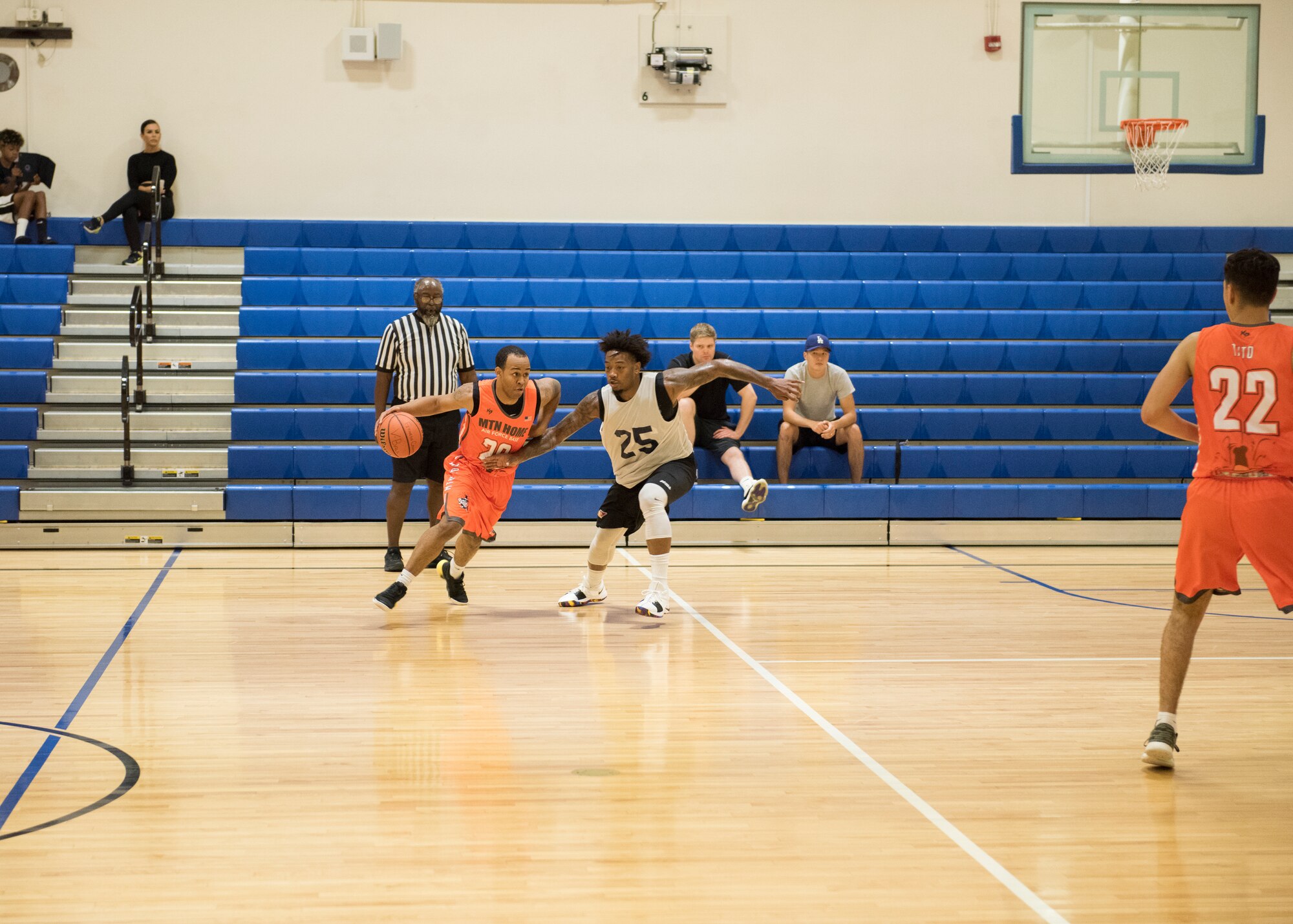 Players for the Mountain Home Air Force Base Gunfighters play against a local basketball team, Aug. 25, 2019, at Mountain Home Air Force Base, Idaho. The Gunfighters faced off with a team made of college players and players who've participated in the National Basketball Association's development league. (U.S. Air Force photo by Senior Airman Tyrell Hall)