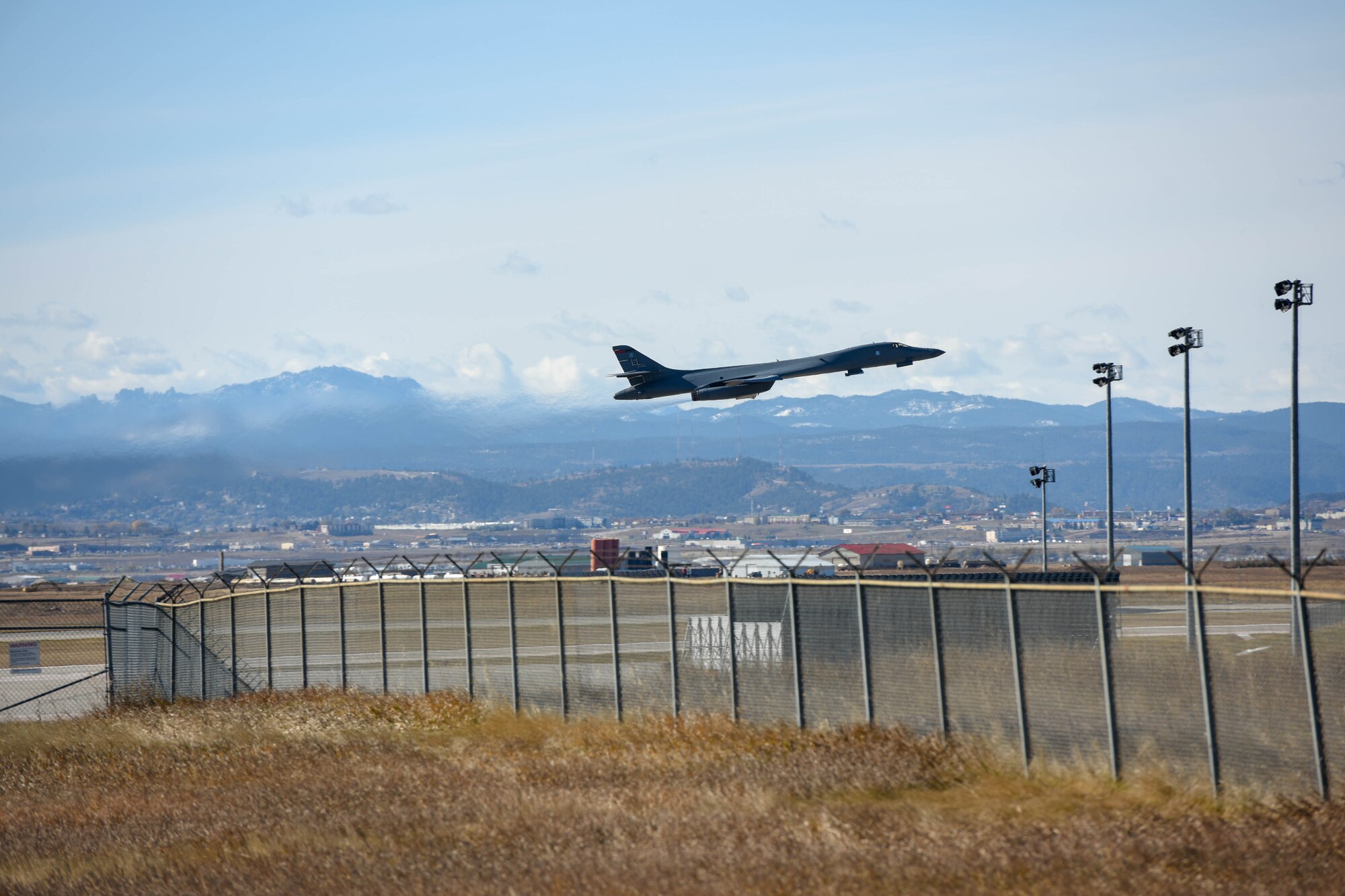 A B-1B Lancer assigned to the 28th Bomb Wing, takes off from Ellsworth Air Force Base, S.D., Oct. 24, 2019, to support a Bomber Task Force in the U.S. Central Command area of operations. The B-1 can rapidly deliver massive quantities of precision and non-precision weapons against any adversary. The Department of Defense maintains command and control of its bomber force for any mission, anywhere in the world, at any time. (U.S. Air Force photo by Master Sgt. Kenya N. Shiloh)