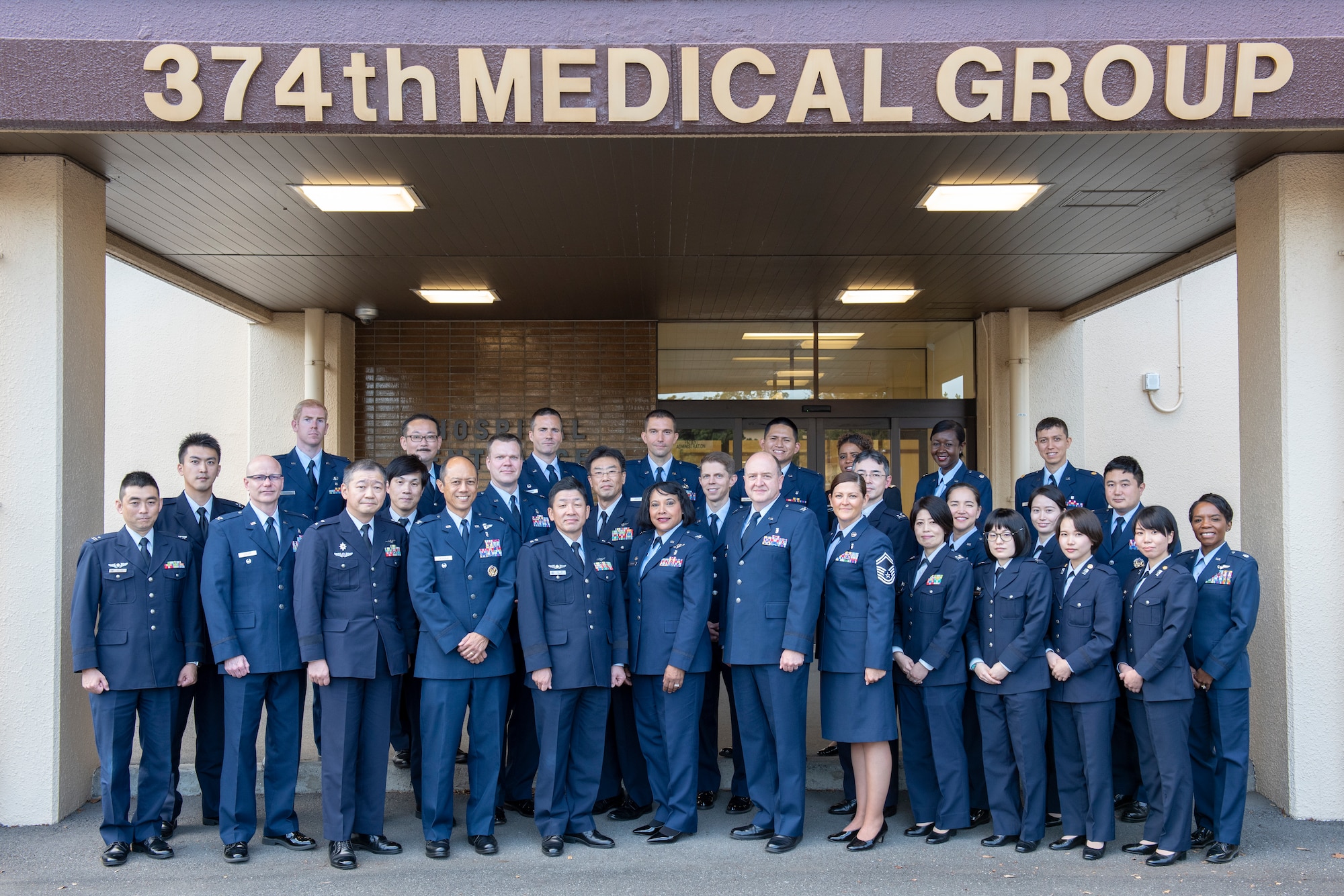Leadership from Headquarters Pacific Air Forces and the 374th Medical Group, Japanese Air Self-Defense Force Maj. Gen. Shinya Bekku, JASDF Surgeon General, his staff, and JASDF Maj. Gen. Naruo Kuwada, JASDF Aeromedical Laboratory commander, pose for a photo after a meeting at Yokota Air Base, Japan, Oct. 28, 2019.