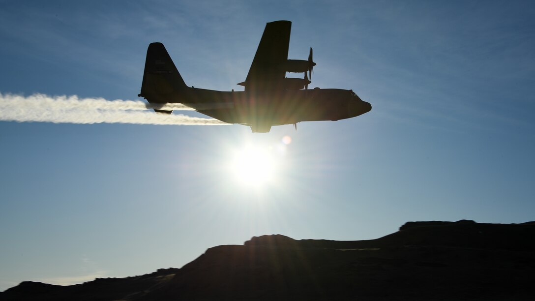 A C-130 Hercules assigned to the Air Force Reserve 757th Airlift Squadron flies over the Utah Test and Training Range Oct. 24, 2019, during an aerial spray operation.
