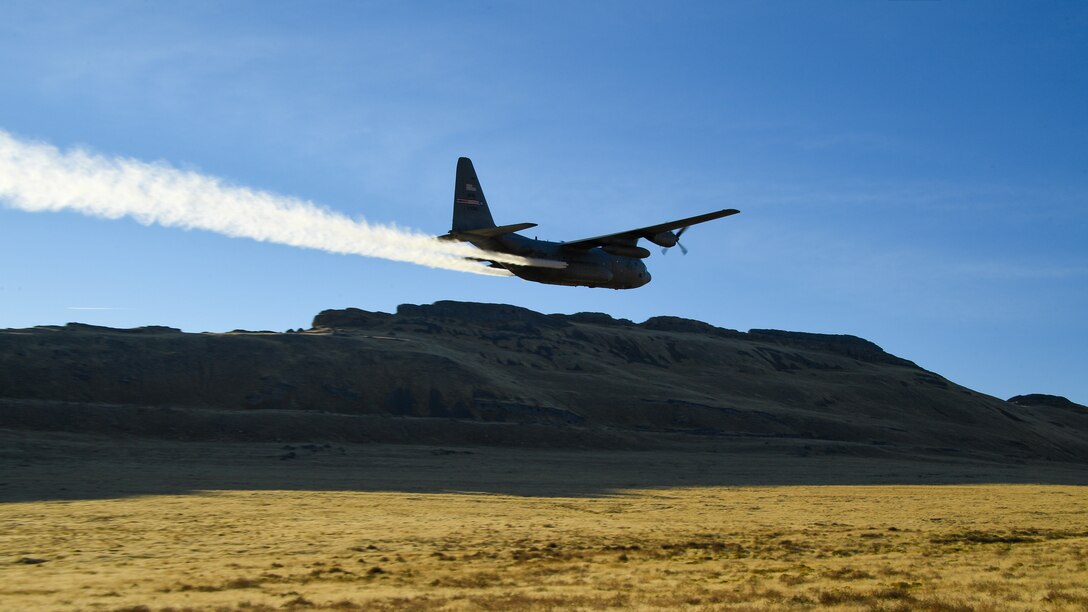 A C-130 Hercules assigned to the Air Force Reserve 757th Airlift Squadron flies over the Utah Test and Training Range Oct. 24, 2019, during an aerial spray operation.