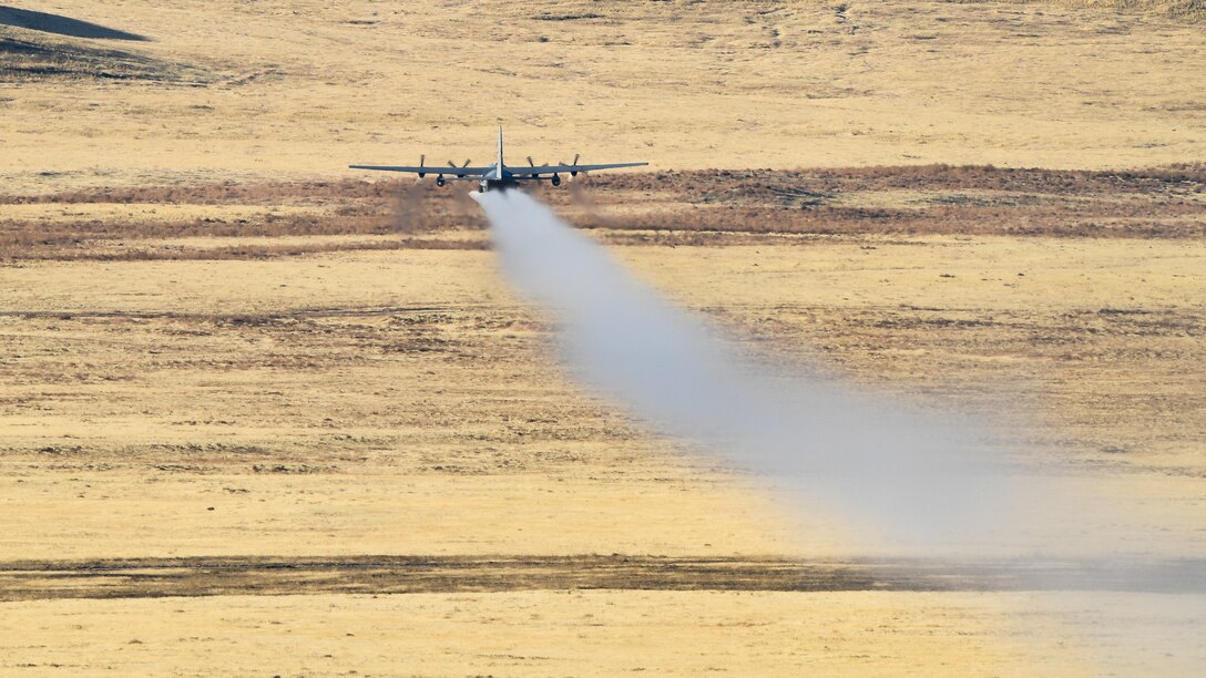 A C-130 Hercules assigned to the Air Force Reserve 757th Airlift Squadron flies over the Utah Test and Training Range Oct. 24, 2019, during an aerial spray operation.