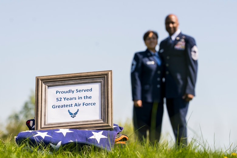 Retired U.S. Air Force Chief Master Sgt. Robinson Joseph, former U.S. Air Forces in Europe - Air Forces Africa Chief Enlisted Manager for the Air Force Installation Contracting Center, and his wife, retired Chief Master Sgt. Leenette Joseph, former USAFE Equal Opportunity functional manager, retired together at Ramstein Air Base on Oct. 25, 2019.