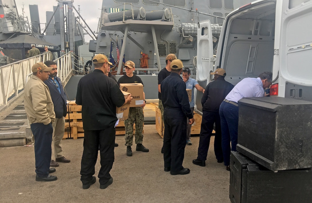 DLA delivers fresh baked goods to  USS Carney