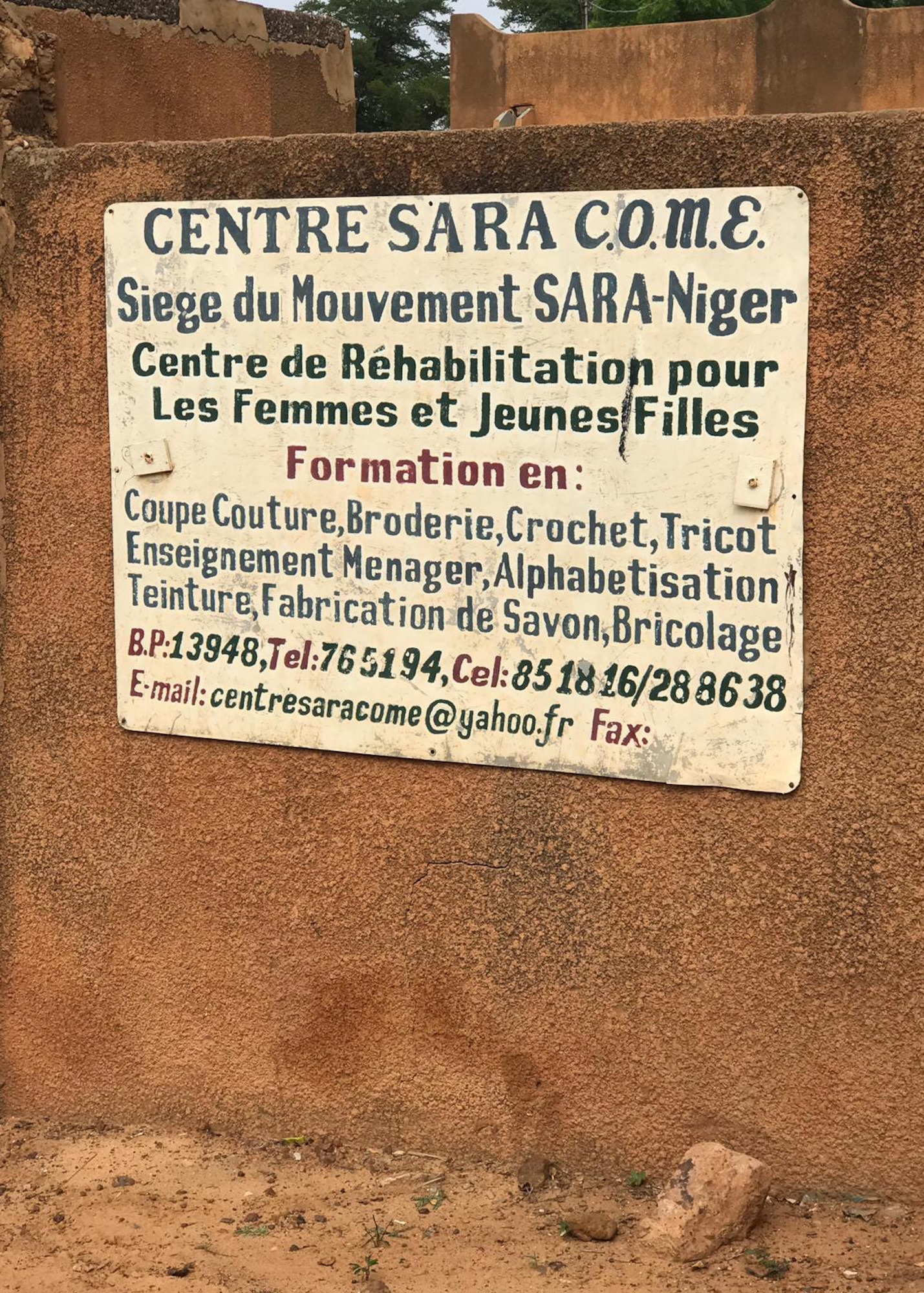 Pictured is the sign for the Sara-Niger Rehabilitation Center Movement for Women and Girls in Niamey, Niger. From Sept. 21 to Oct. 14, 2019, Airmen deployed to Nigerien Air Base 101 and U.S. Embassy personnel renovated the local women’s vocational school that teaches local women techniques for making clothing, providing them with a profession and a source of income. (Courtesy Photo)