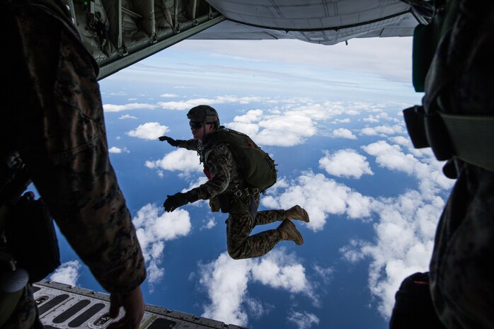 U.S. Marines with 3rd Reconnaissance Battalion, 3rd Marine Division conduct parachute operations by jumping out of a KC-130 Hercules on Ie Shima, Okinawa, Japan, Oct. 28-30, 2019.  This combined training included Marines from 3rd Transportation Support Battalion, 3rd Marine Logistics Group, as well as support from Marine Aerial Refueler Transport Squadron 152 and Marine Light Attack Helicopter Squadron 169, 1st Marine Aircraft Wing.  This military training ensures the Marines from III Marine Expeditionary Force are constantly trained and ready to provide aerial delivery of personnel or equipment wherever needed, quickly and effectively.  The U.S. military training conducted in the INDOPACIFIC area also provides security to the region, to include our Japanese Allies.