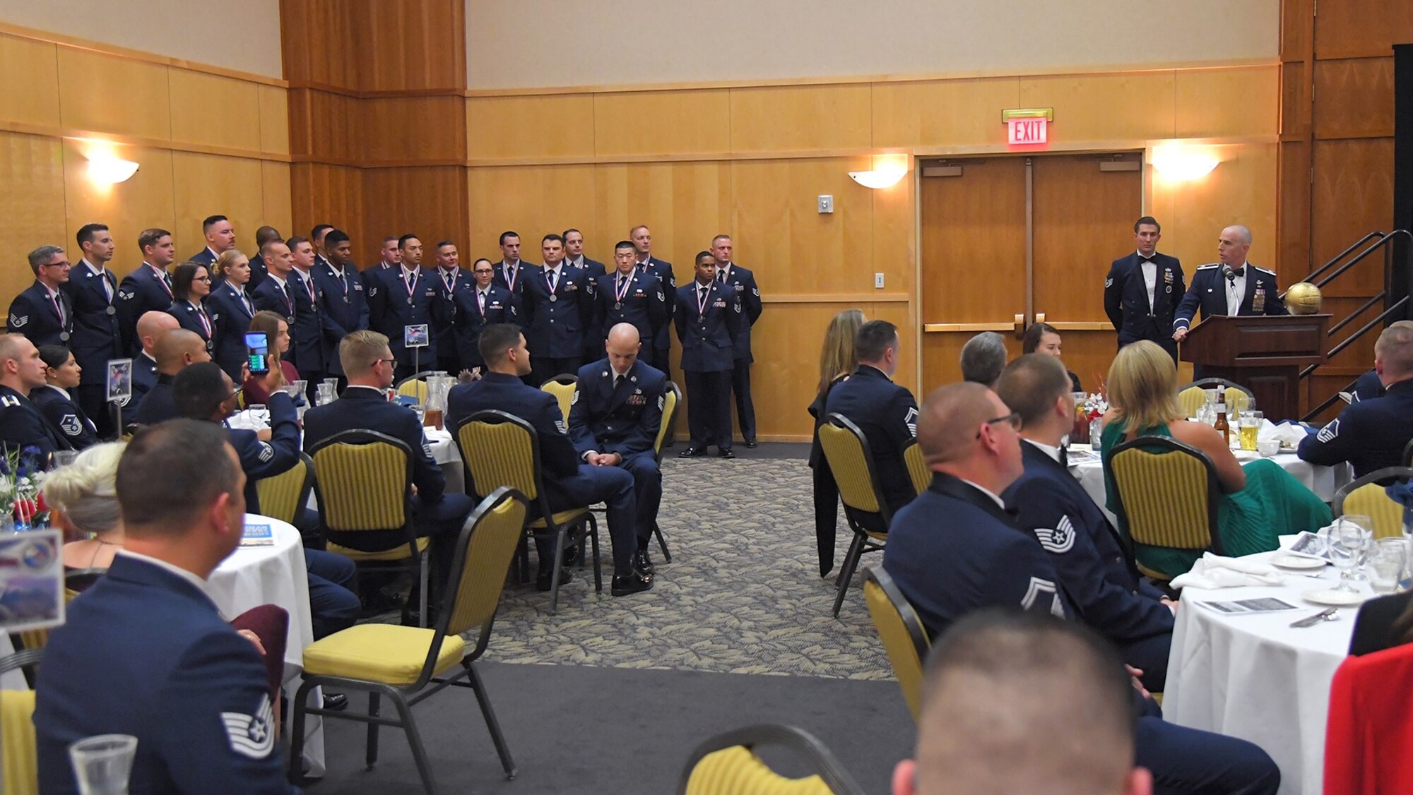 The graduates of Airman Leadership School Class 19-G and guests during a graduation ceremony Oct. 24, 2019, at Hill Air Force Base, Utah. Twenty-two Airmen completed the enlisted professional military education course. (U.S. Air Force photo by Todd Cromar)