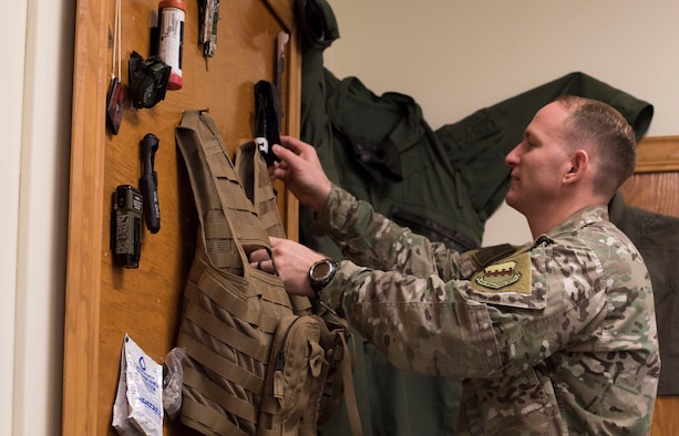 U.S. Air Force Tech. Sgt. David Jones, 20th Operations Support Squadron noncommissioned officer in charge of operations, weapons and tactics, looks at training gear in a classroom at Shaw Air Force Base, South Carolina, Oct. 21, 2019.