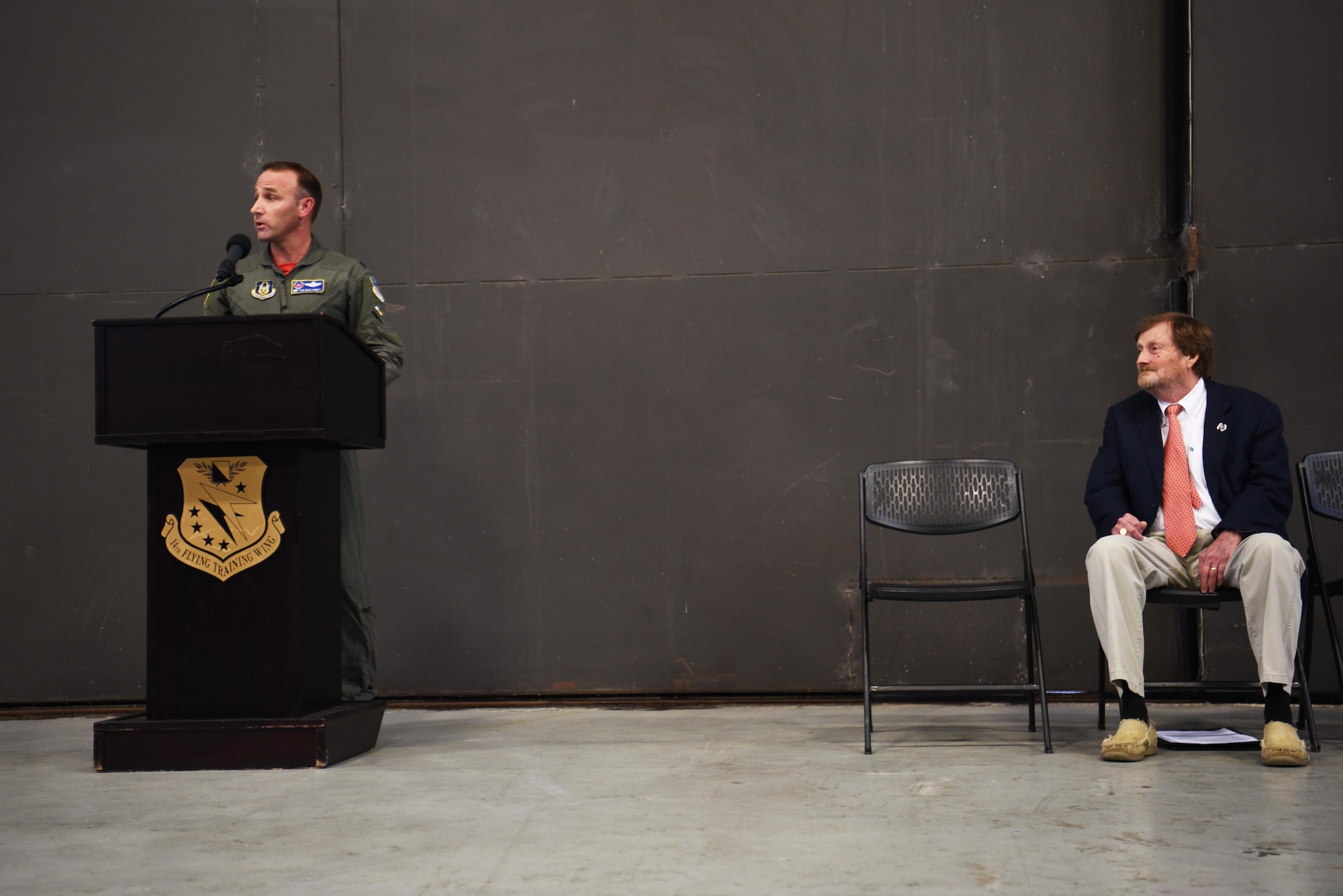 Lt. Col. Tom McElhinney, 43rd Flying Training Squadron commander, and Rufus Ward, 43rd FTS honorary commander, attend and speak at the T-1 Jayhawk paint unveiling ceremony Oct. 25, 2019, on Columbus Air Force Base, Miss. The 43rd FTS origins date back to almost 80 years ago on Dec. 22, 1939, as the 29th Bombardment Squadron which was then redesignated the 43rd Bombardment Squadron on March 13, 1940, at Langely Field, Va. (U.S. Air Force photo by Airman 1st Class Jake Jacobsen)