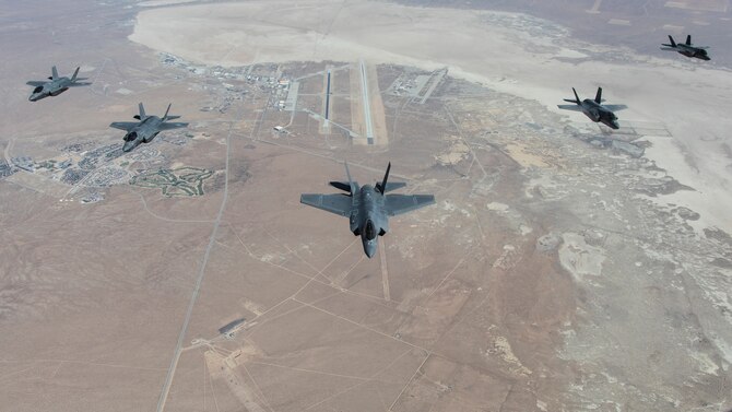 A formation flight of F-35 Lightning IIs over Edwards Air Force Base, California. The 31st Test and Evaluation Squadron recently completed its initial operational test and evaluation mission and six F-35s were reassigned to the 422nd Test and Evaluation Squadron at Nellis Air Force Base, Nevada. Included in the formation are two F-35As, two F-35Bs, and one F-35C. (Photo courtesy of Darin Russell, Lockheed Martin)