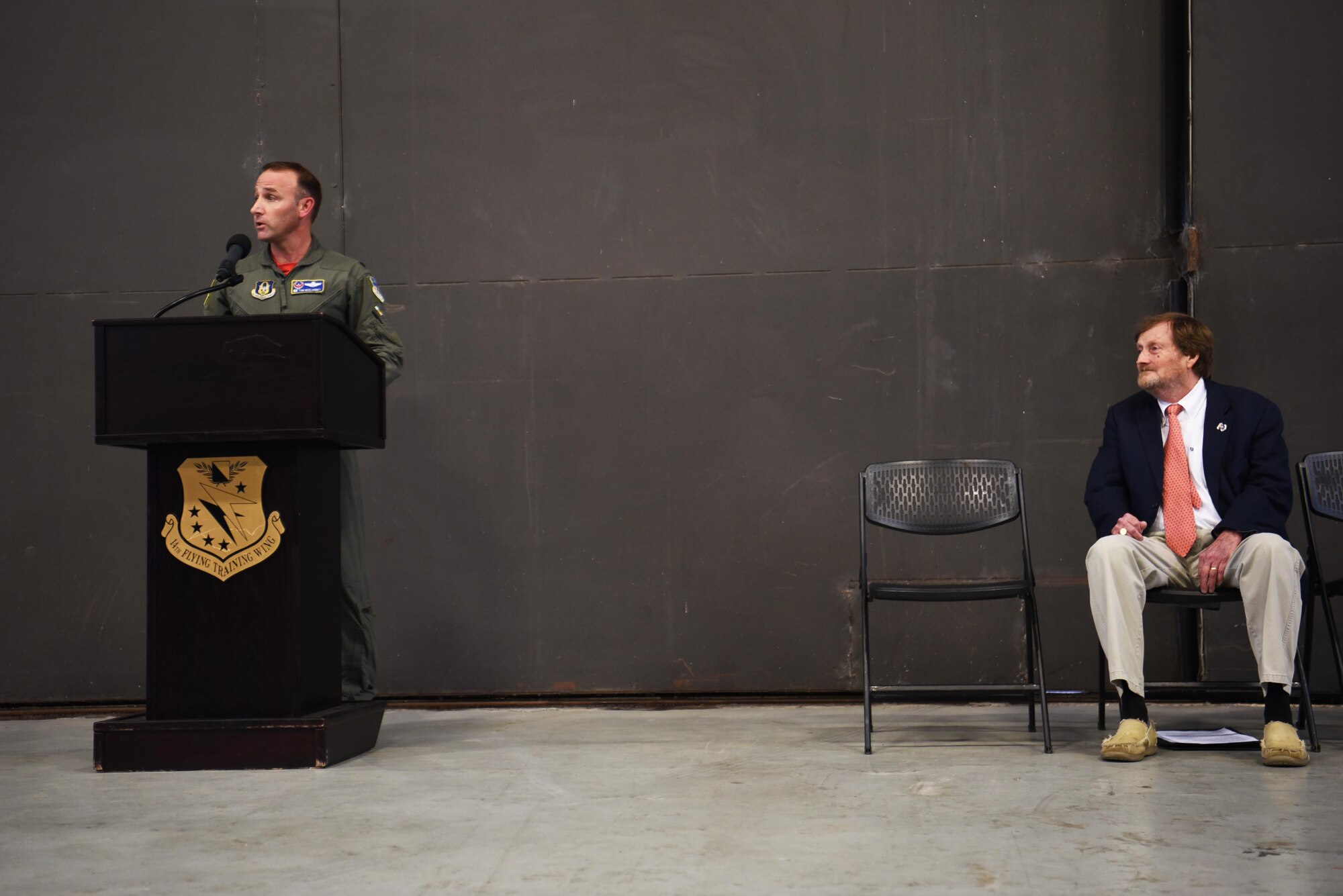 Lt. Col. Tom McElhinney, 43rd Flying Training Squadron commander, and Rufus Ward, 43rd FTS honorary commander, attend and speak at the T-1 Jayhawk paint unveiling ceremony Oct. 25, 2019, on Columbus Air Force Base, Miss. The 43rd FTS origins date back to almost 80 years ago on Dec. 22, 1939, as the 29th Bombardment Squadron which was then redesignated the 43rd Bombardment Squadron on March 13, 1940, at Langely Field, Va. (U.S. Air Force photo by Airman 1st Class Jake Jacobsen)