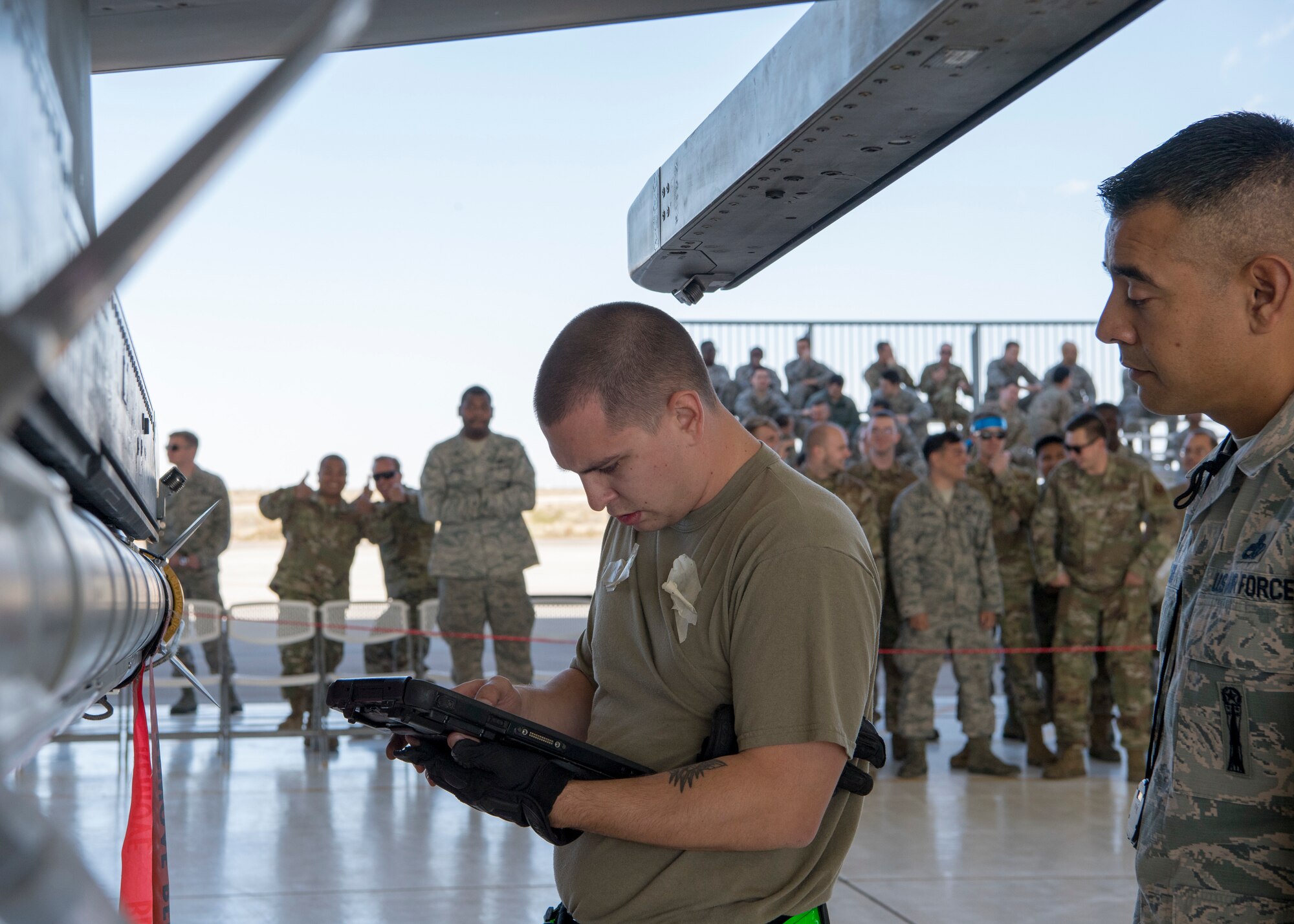 Staff Sgt. Edward Spidle, 311th Aircraft Maintenance Unit weapons load crew chief, ensures all equipment is accounted for during a load competition, Oct. 28, 2019, on Holloman Air Force Base, N.M. Two F-16 Vipers and two MQ-9 Reapers were used to test the loading skills of 12 Airmen during the 2019 third quarter load competition. (U.S. Air Force photo by Airman 1st Class Autumn Vogt)