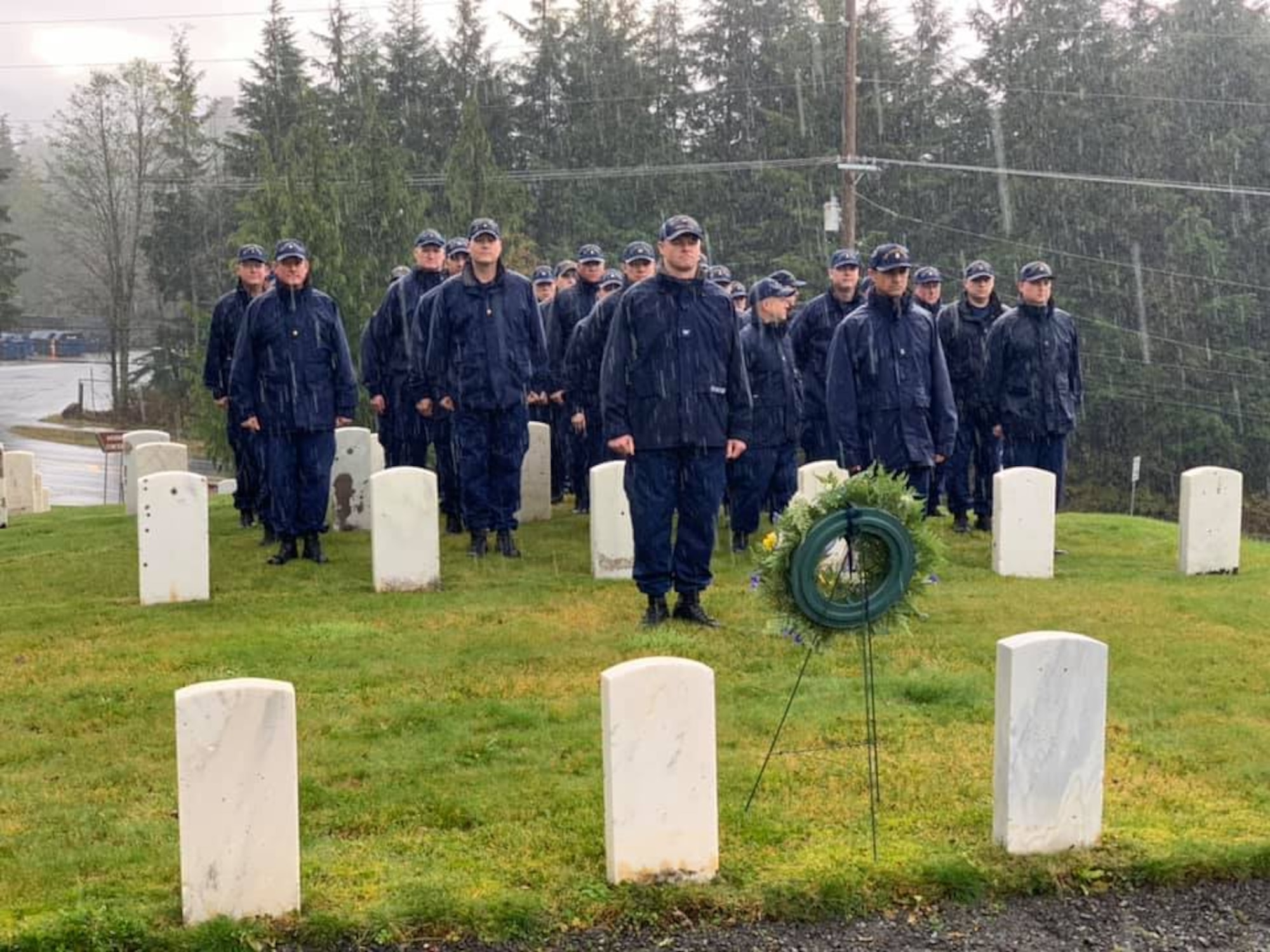 USARAK Commanding General Maj. Gen. Pete Andrysiak Jr., and U.S. Coast Guard Air Station Sitka Commanding Officer Capt. Mike Frawley, lay wreaths during the Alaska Day Memorial Ceremony, Oct. 18, at the Sitka National Cemetery, Alaska. The ceremony, led by USARAK Command Chaplain (Lt. Col.) Sun Lee, paid tribute to the military veterans buried there. The past and present merged on Oct. 18 as service members participated and reenactors recreated the historical 1867 transfer of the Territory of Alaska from Russia to the United States at Castle Hill in Sitka. The Transfer Ceremony 1867 Commemoration is the main event of the annual Alaska Day Festival, which has been held in the city and Borough of Sitka for 70 years. The USARAK Soldiers continued the legacy of the U.S. Army’s 9th Infantry Regiment troops who participated in the 1867 ceremony. (U.S. Army photo by Derrick Crawford)