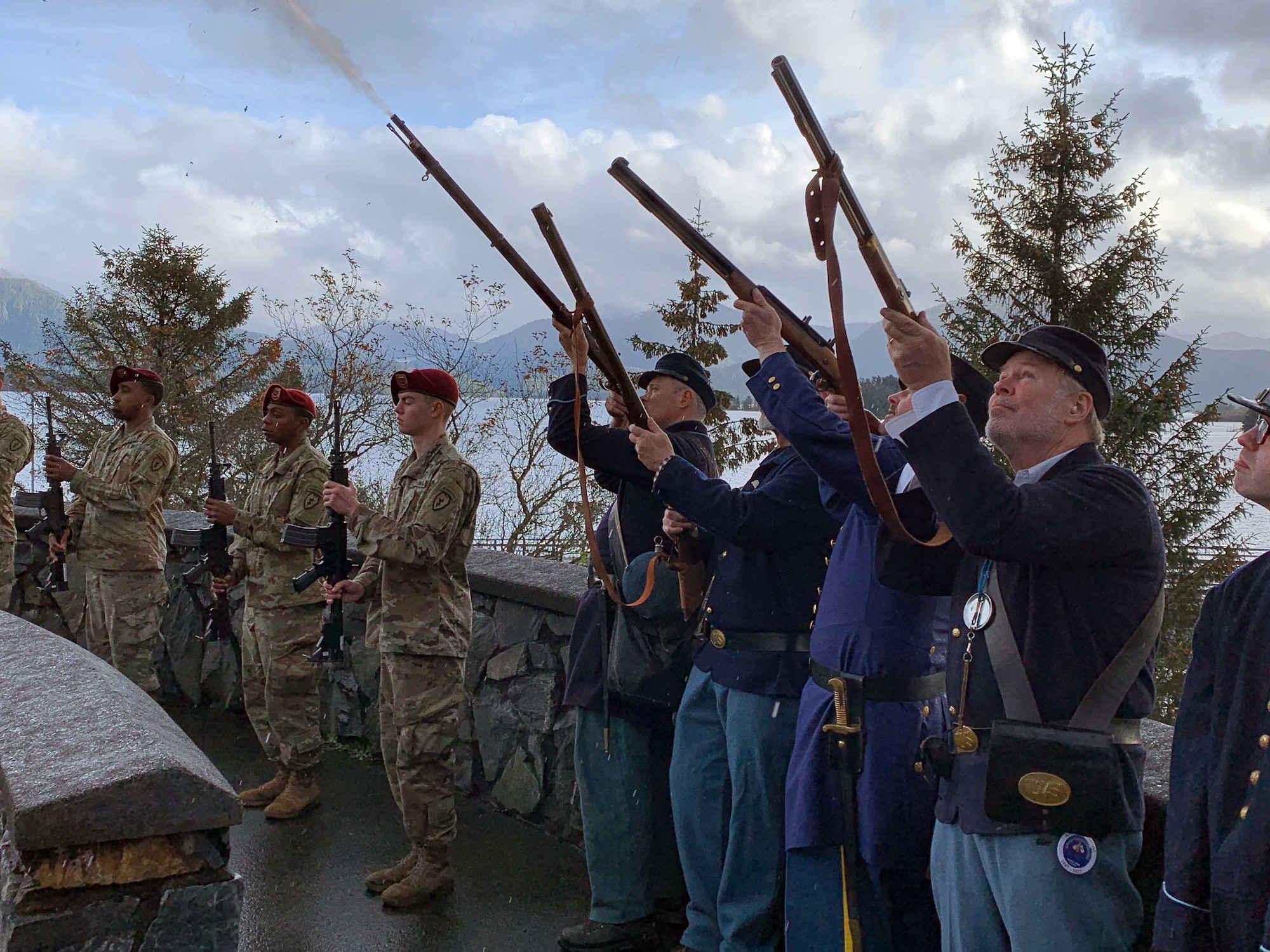 U.S. Army Alaska Soldiers with 725th Brigade Support Battalion, 4th Brigade Combat Team (Airborne), 25th Infantry Division, and the 9th Army Band participate in the 2017 Alaska Day Festival in Sitka, Alaska, Oct. 18. The past and present merged on Oct. 18 as service members participated and reenactors recreated the historical 1867 transfer of the Territory of Alaska from Russia to the United States at Castle Hill in Sitka. The Transfer Ceremony 1867 Commemoration is the main event of the annual Alaska Day Festival, which has been held in the city and Borough of Sitka for 70 years. The USARAK Soldiers continued the legacy of the U.S. Army’s 9th Infantry Regiment troops who participated in the 1867 ceremony. (U.S. Army photo by Derrick Crawford)