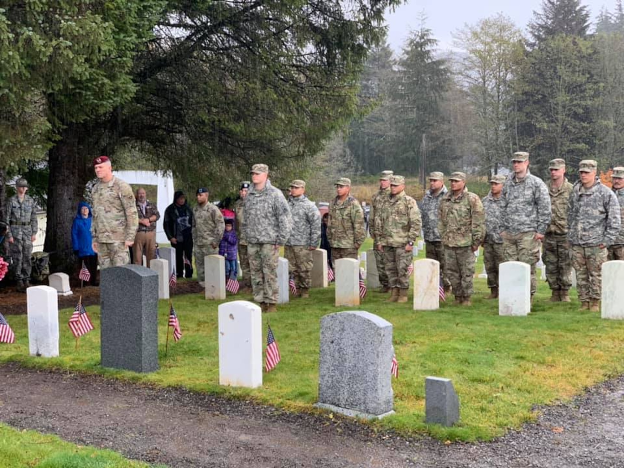 USARAK Commanding General Maj. Gen. Pete Andrysiak Jr., and U.S. Coast Guard Air Station Sitka Commanding Officer Capt. Mike Frawley, lay wreaths during the Alaska Day Memorial Ceremony, Oct. 18, at the Sitka National Cemetery, Alaska. The ceremony, led by USARAK Command Chaplain (Lt. Col.) Sun Lee, paid tribute to the military veterans buried there. The past and present merged on Oct. 18 as service members participated and reenactors recreated the historical 1867 transfer of the Territory of Alaska from Russia to the United States at Castle Hill in Sitka. The Transfer Ceremony 1867 Commemoration is the main event of the annual Alaska Day Festival, which has been held in the city and Borough of Sitka for 70 years. The USARAK Soldiers continued the legacy of the U.S. Army’s 9th Infantry Regiment troops who participated in the 1867 ceremony. (U.S. Army photo by Derrick Crawford)