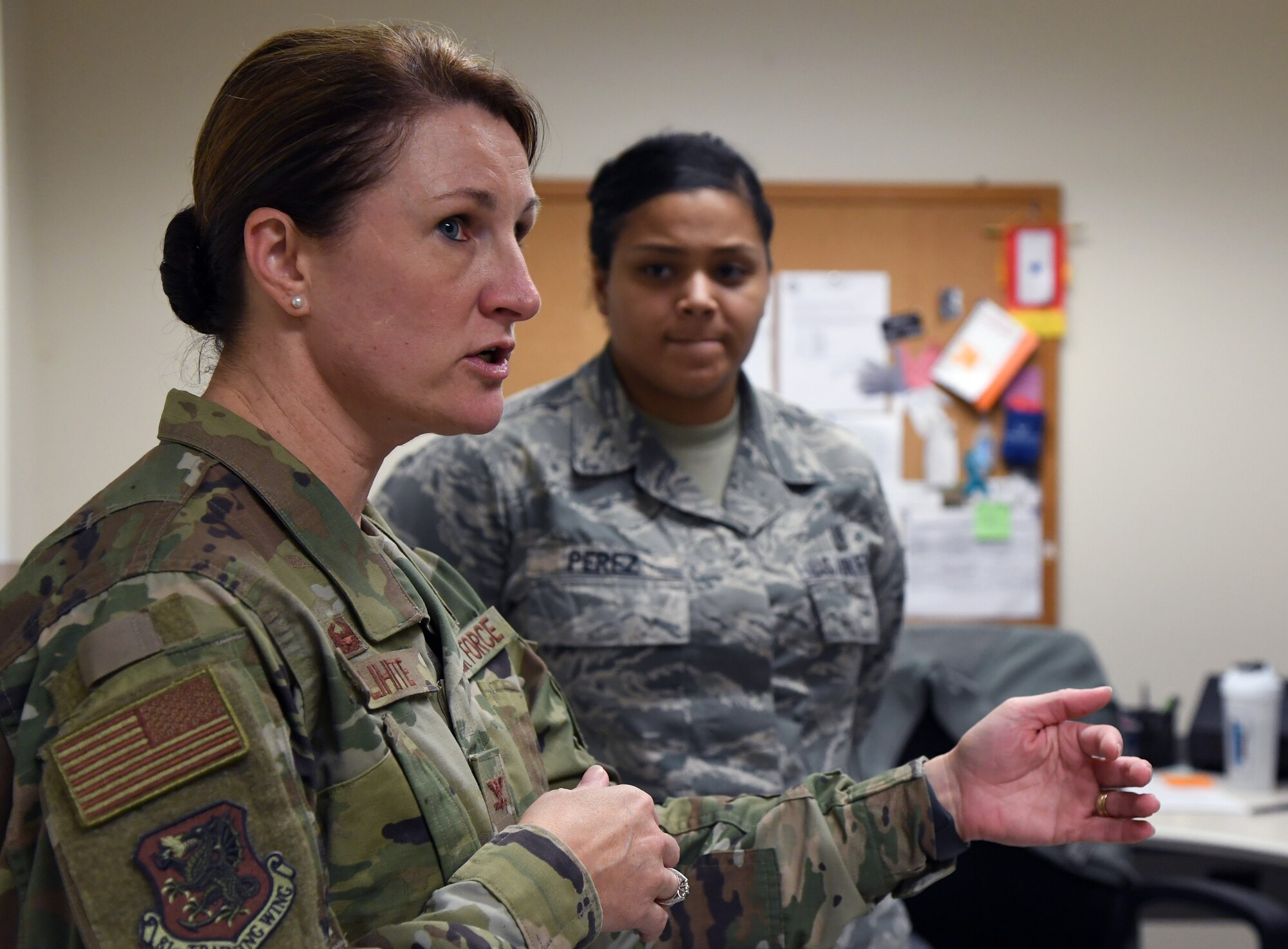 U.S. Air Force Col. Beatrice Dolihite, 81st Medical Group commander, discusses the Base Operation Medicine Cell administration procedures with staff members inside the Keesler Medical Center at Keesler Air Force Base, Mississippi, Aug. 22, 2019. The "Dragon Medic Experience" allowed the 81st MDG leadership to work side-by-side with group medics in order to understand the challenges and barriers they may face while providing care. It also allowed them to see first-hand the great ideas that the staff has implemented to focus on the patient experience. This experience helps us cultivate an environment where senior leadership has direct engagement and connection with our front line medics who strive to deliver outstanding care. (U.S. Air Force photo by Kemberly Groue)